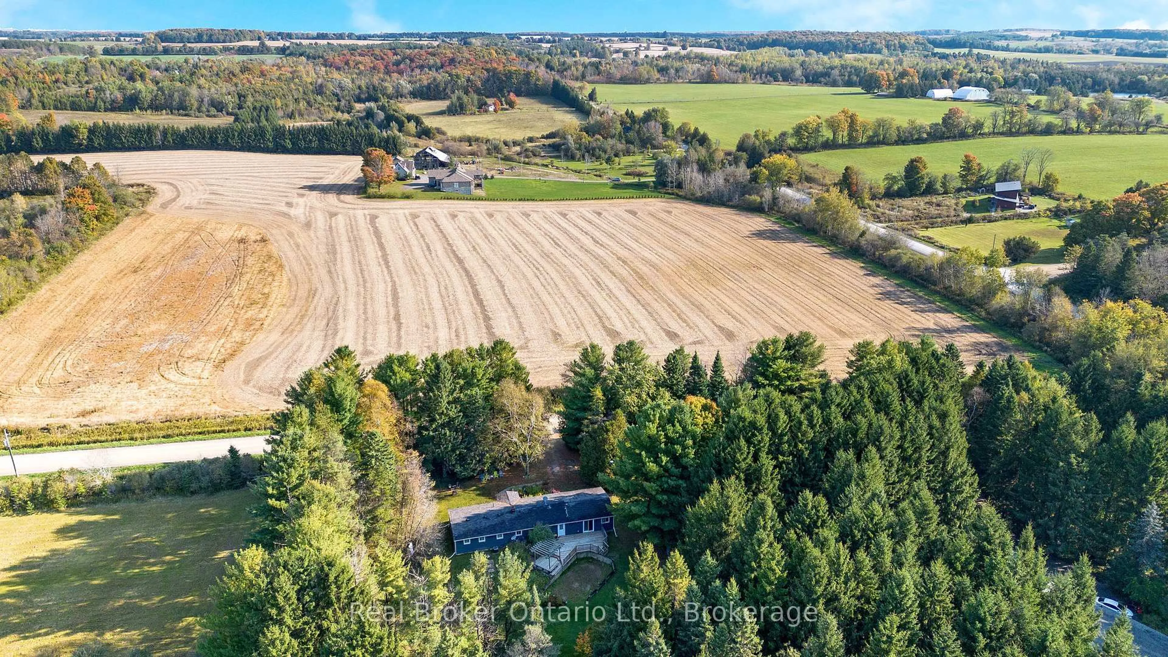 A pic from outside/outdoor area/front of a property/back of a property/a pic from drone, forest/trees view for 111016 11th Line, East Garafraxa Ontario L9W 7A4
