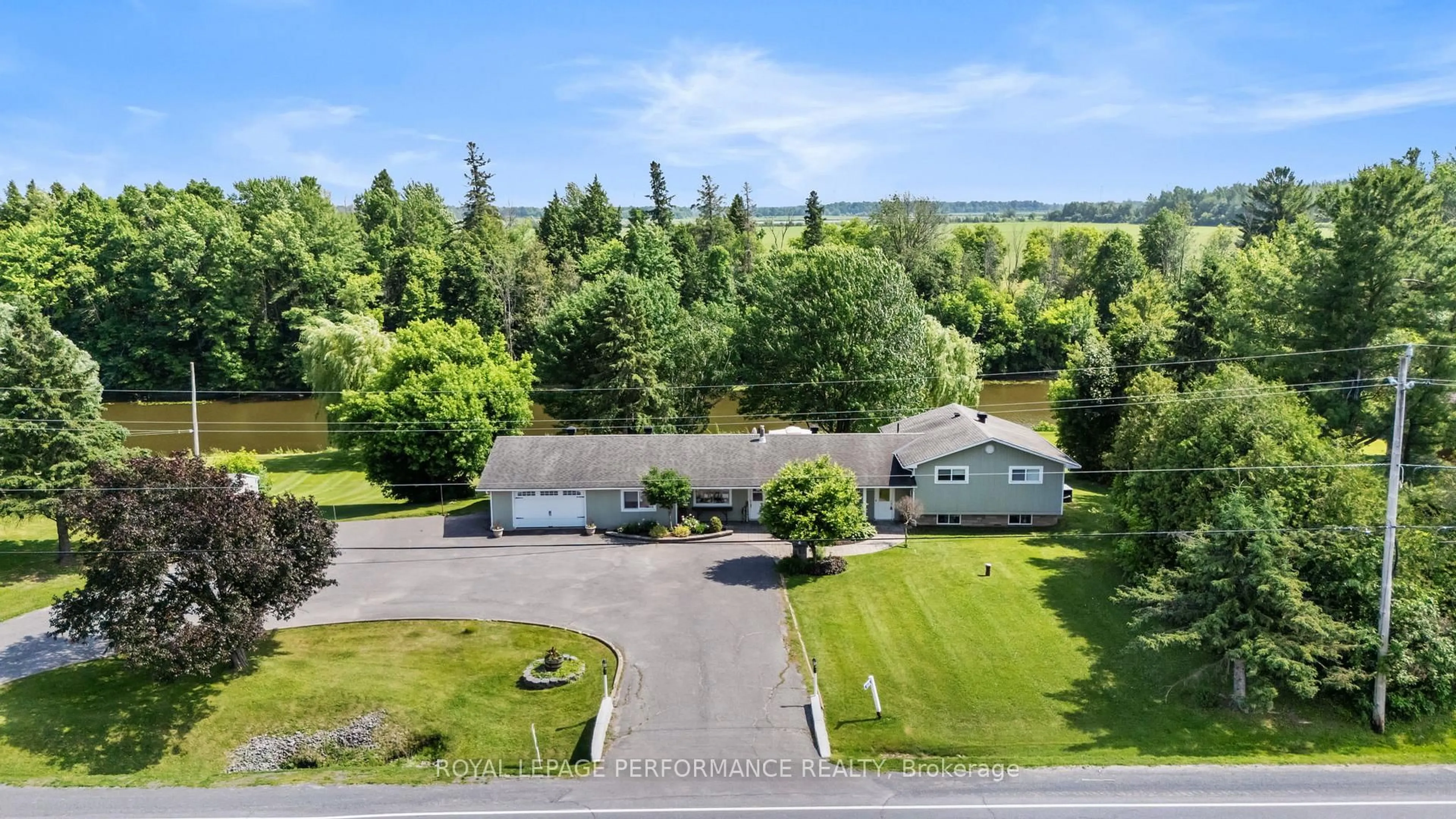A pic from outside/outdoor area/front of a property/back of a property/a pic from drone, water/lake/river/ocean view for 1430 Notre Dame St, Russell Ontario K0A 1W0
