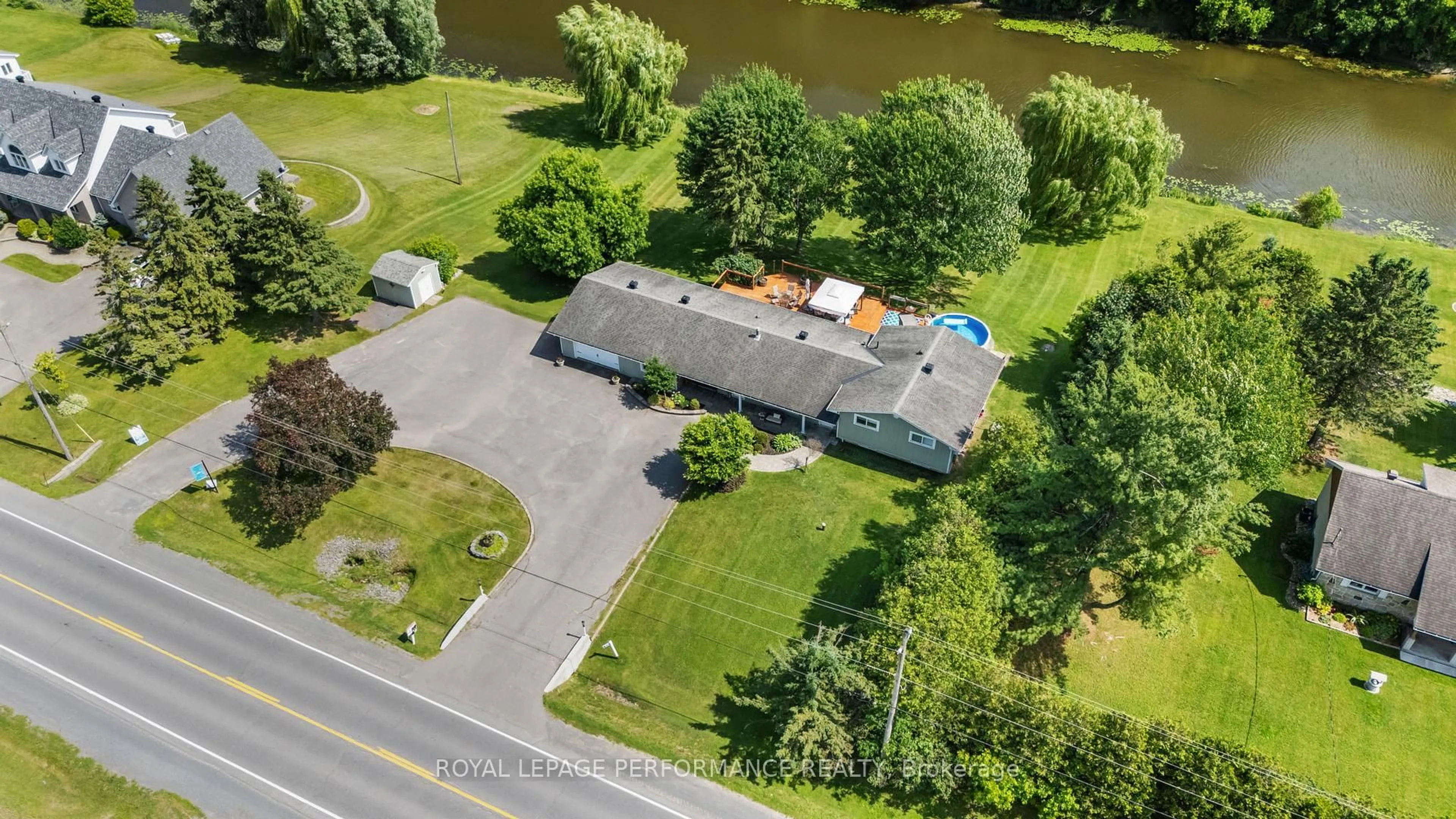 A pic from outside/outdoor area/front of a property/back of a property/a pic from drone, water/lake/river/ocean view for 1430 Notre Dame St, Russell Ontario K0A 1W0