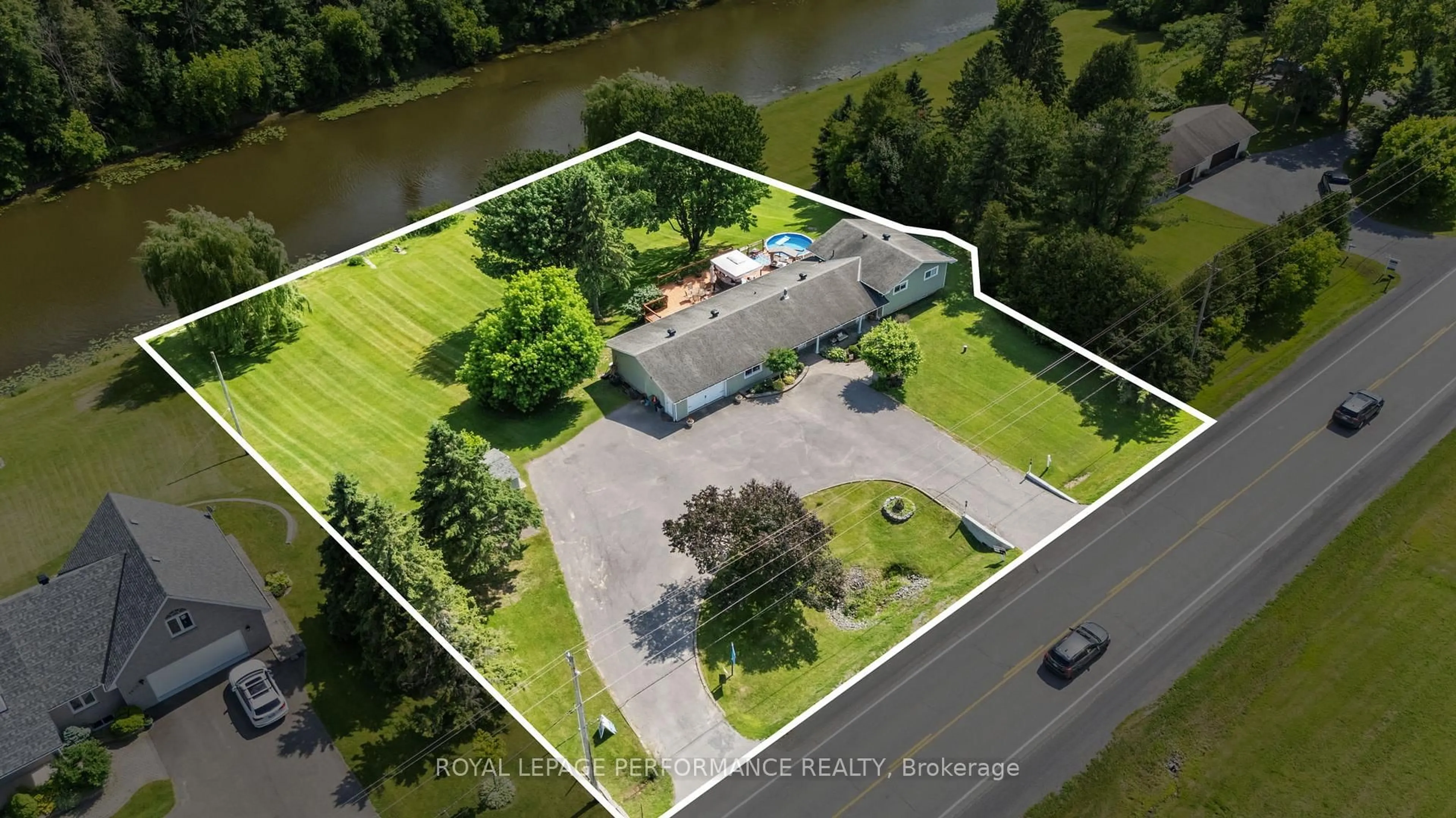A pic from outside/outdoor area/front of a property/back of a property/a pic from drone, water/lake/river/ocean view for 1430 Notre Dame St, Russell Ontario K0A 1W0
