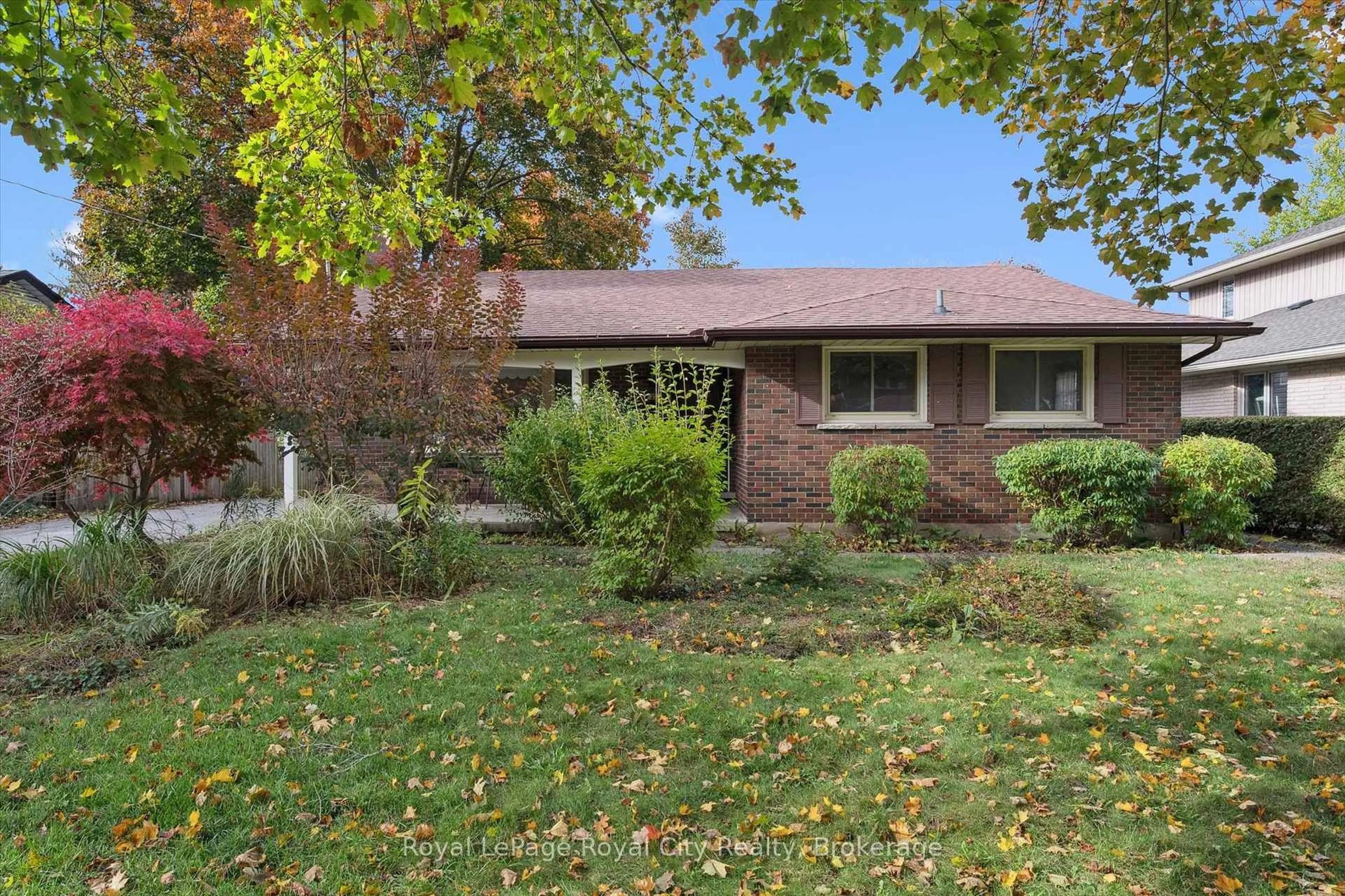 Home with brick exterior material, street for 27 Cedar St, Guelph Ontario N1G 1B9