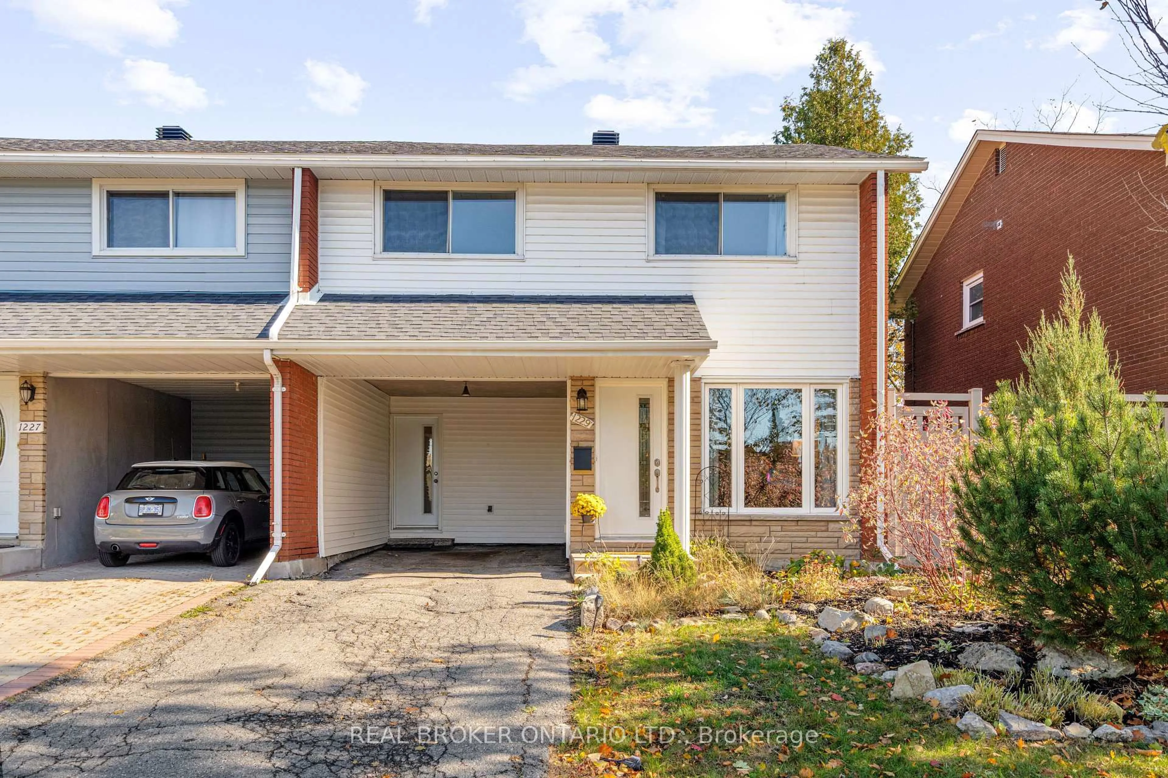 Home with brick exterior material, street for 1229 Cobden Rd, Ottawa Ontario K2C 2Z4