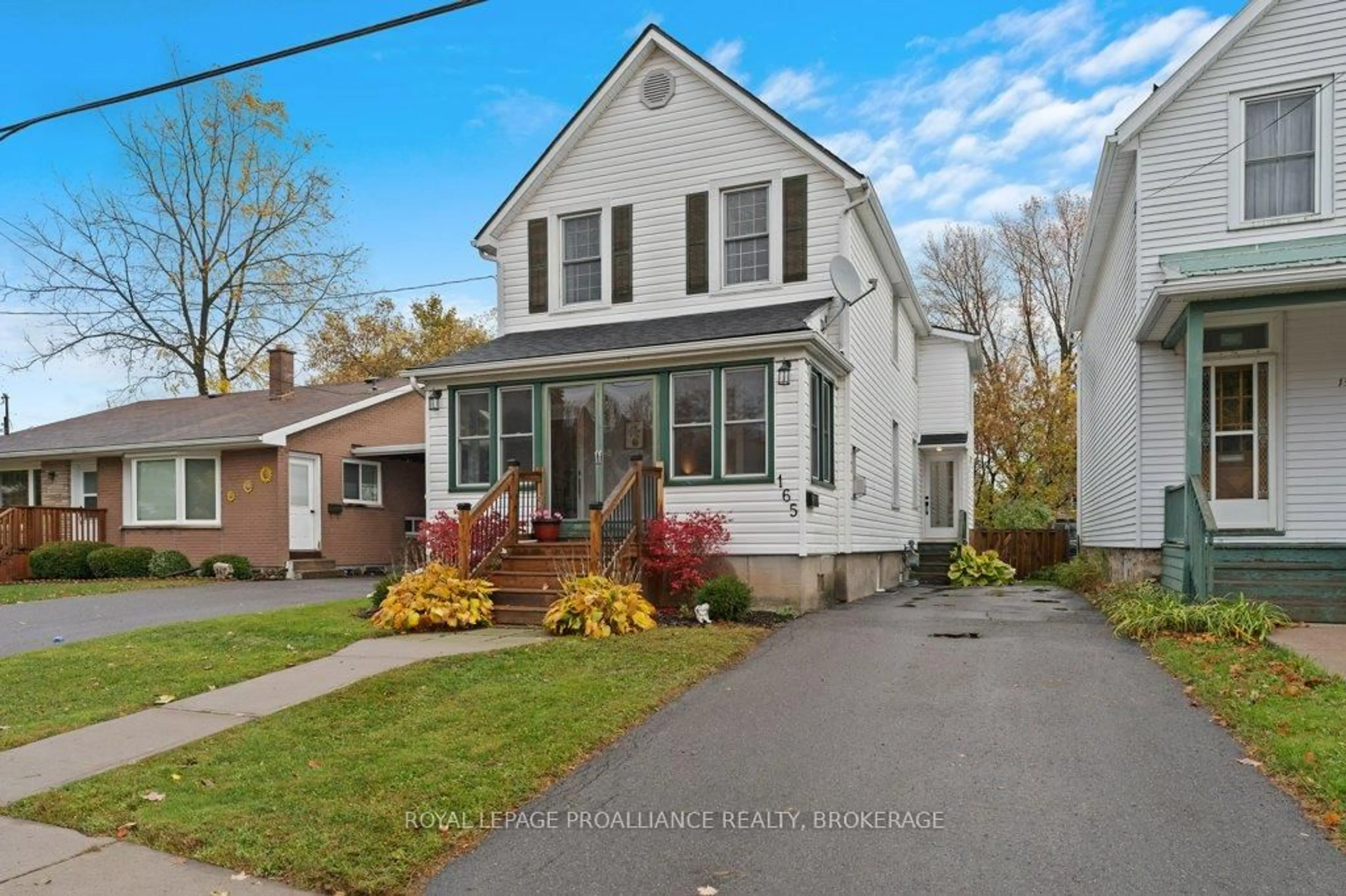 Home with vinyl exterior material, street for 165 Victoria Ave, Gananoque Ontario K7G 2S2