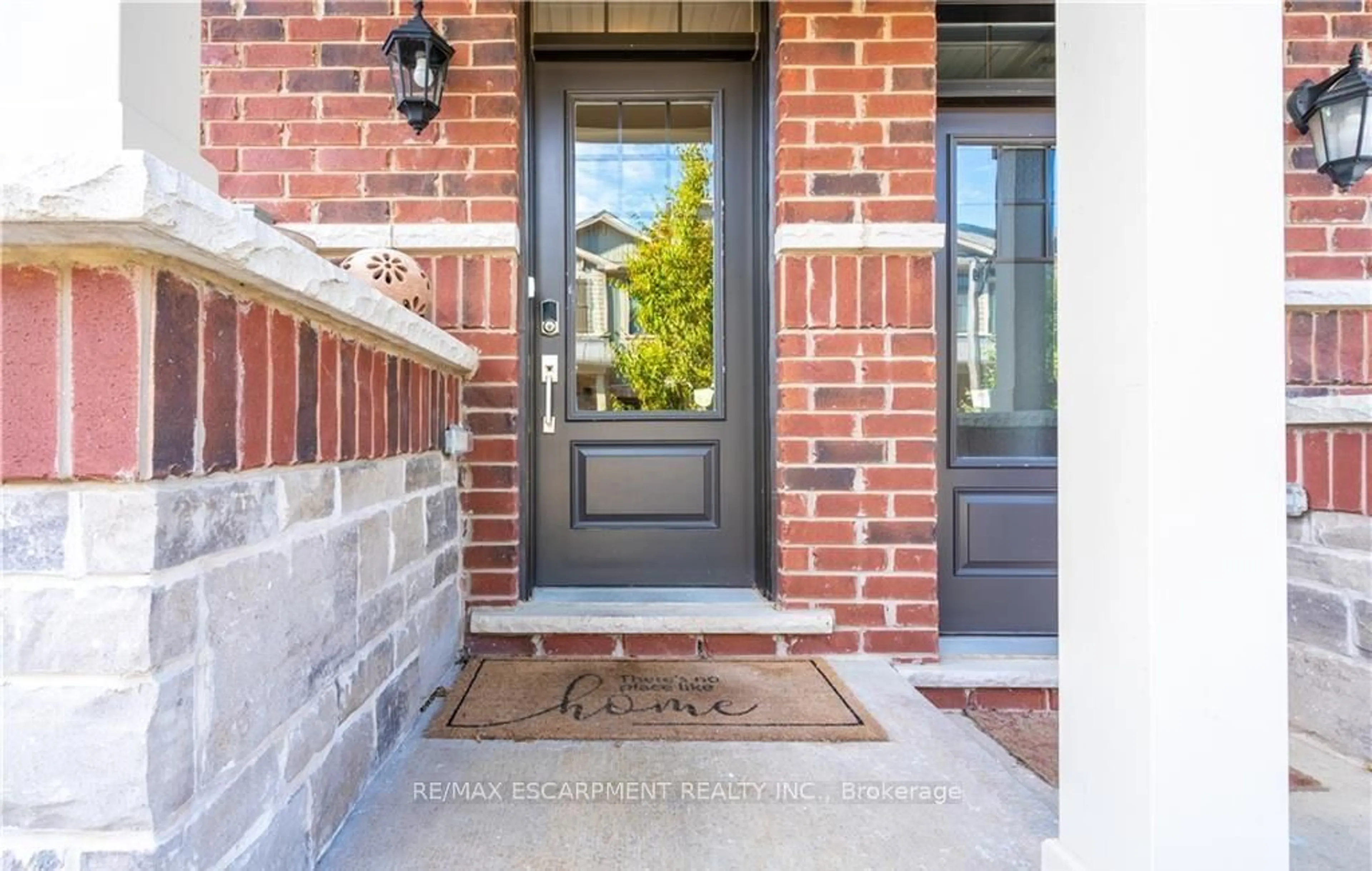 Home with brick exterior material, street for 15 Pierre Trudeau Lane, Grimsby Ontario L3M 0H4