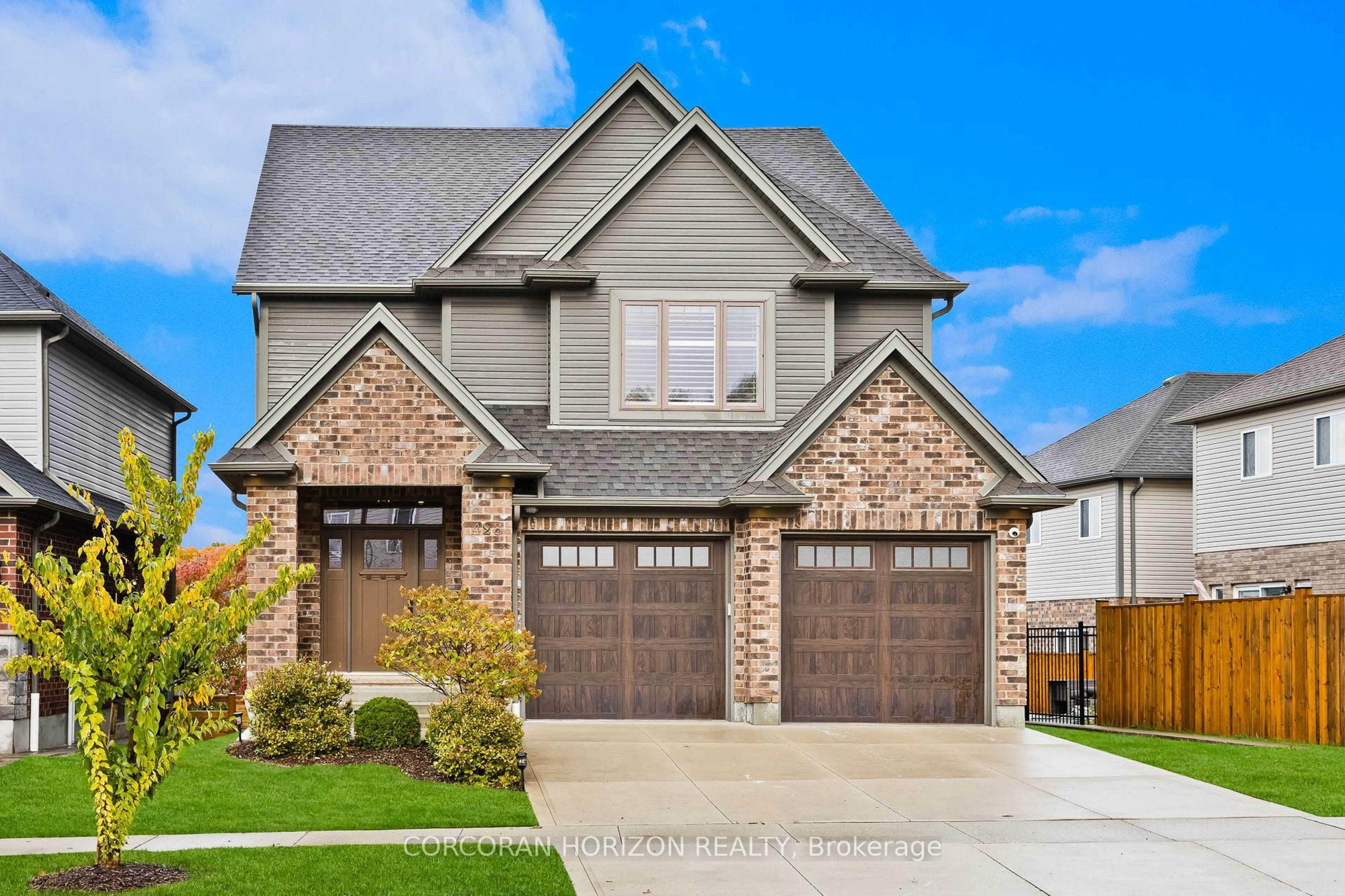 Home with brick exterior material, street for 428 Twinleaf St, Waterloo Ontario N2J 3Z4