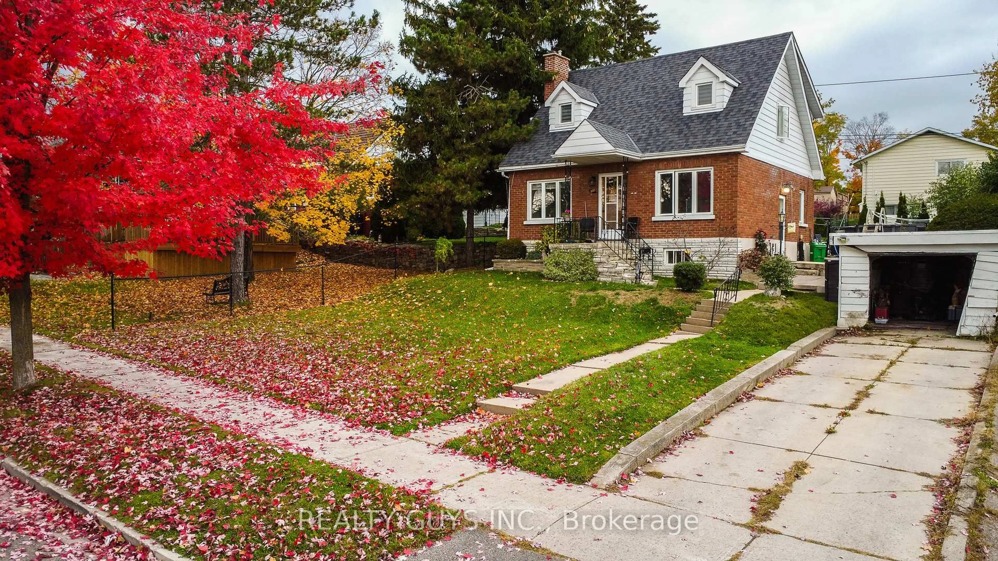 Home with brick exterior material, street for 502 Wellington St, Peterborough Ontario K9H 5C5