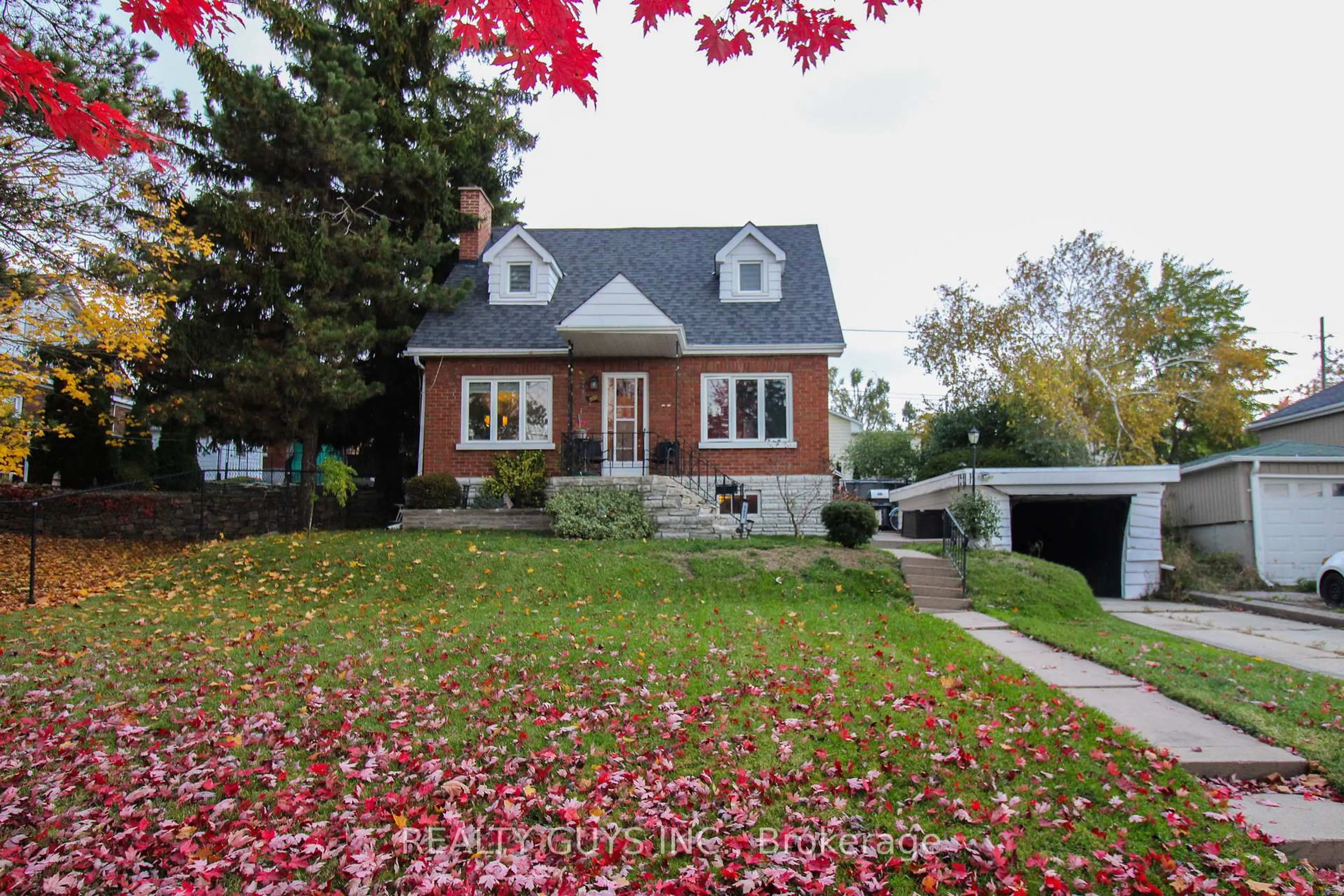 Home with brick exterior material, street for 502 Wellington St, Peterborough Ontario K9H 5C5