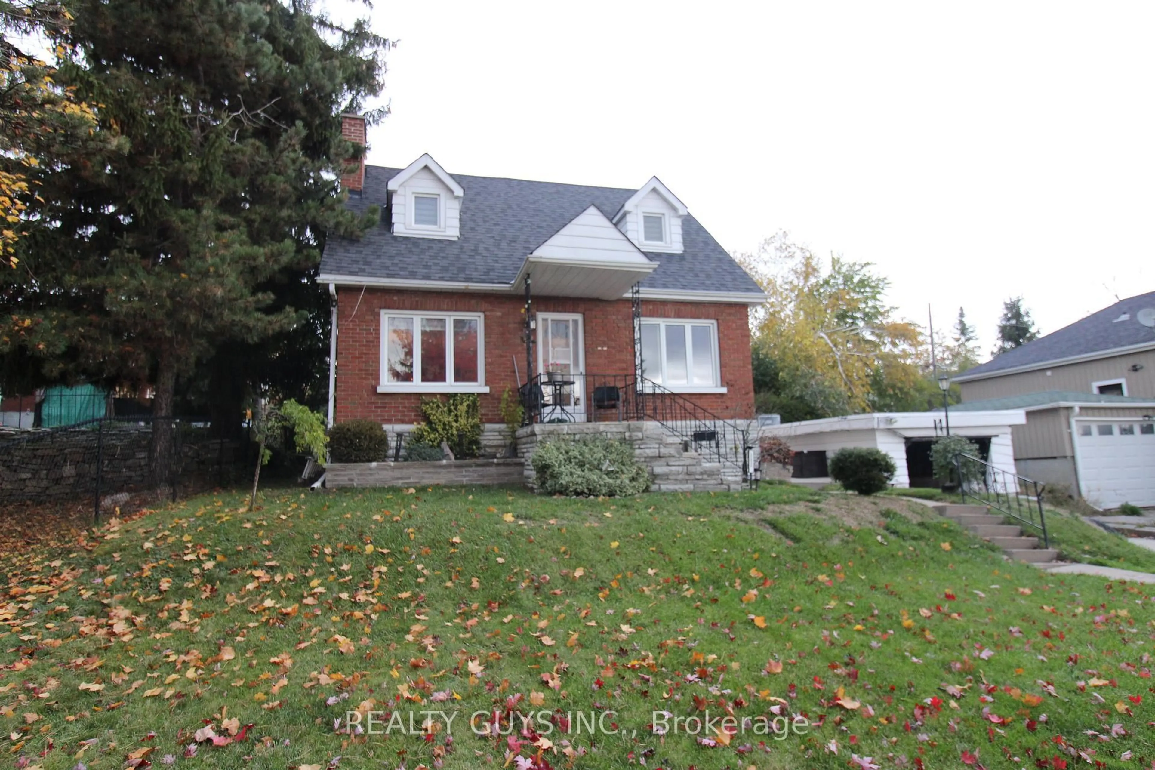 Home with brick exterior material, street for 502 Wellington St, Peterborough Ontario K9H 5C5