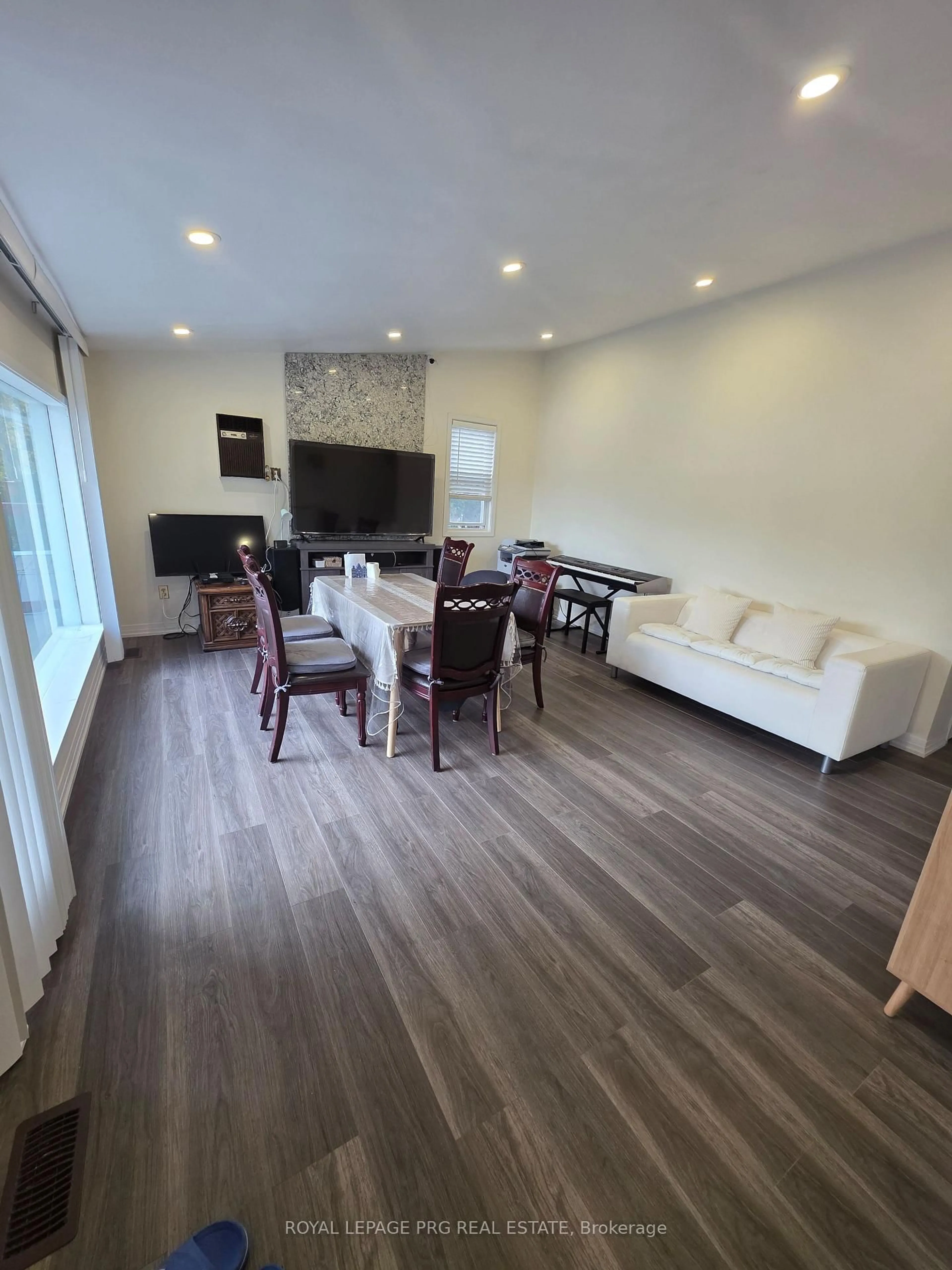 Living room with furniture, wood/laminate floor for 183 McGuire Beach Rd, Kawartha Lakes Ontario K0M 2B0
