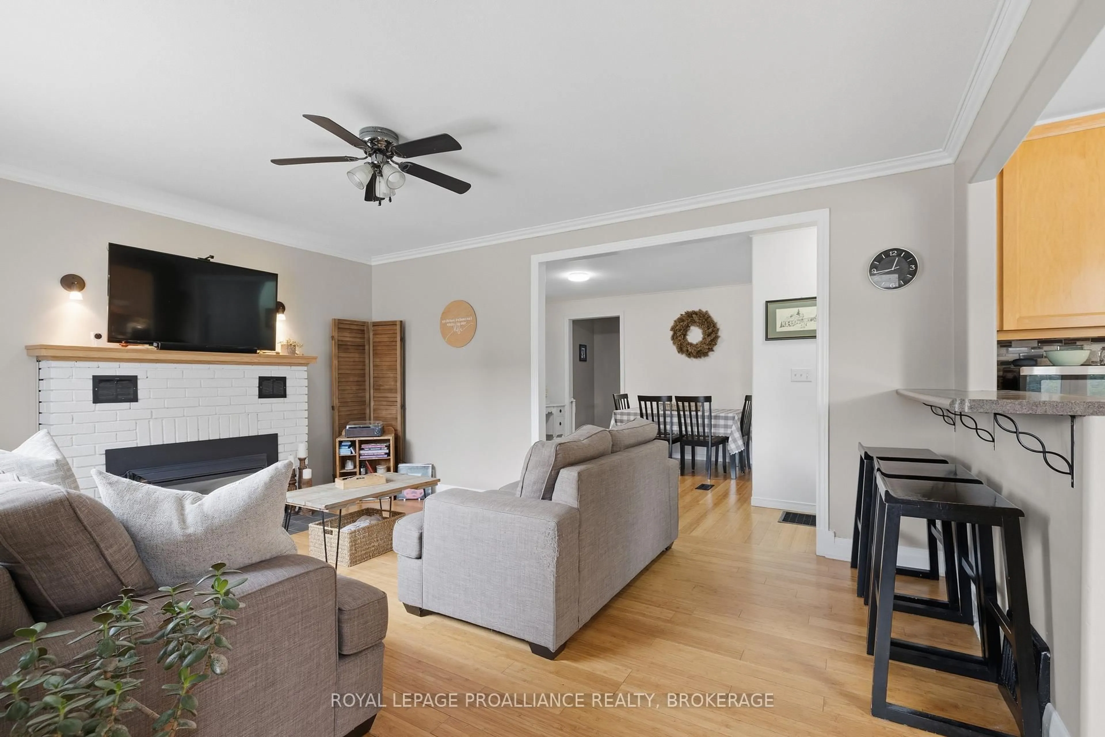 Living room with furniture, wood/laminate floor for 225 East St, Greater Napanee Ontario K7R 1S9