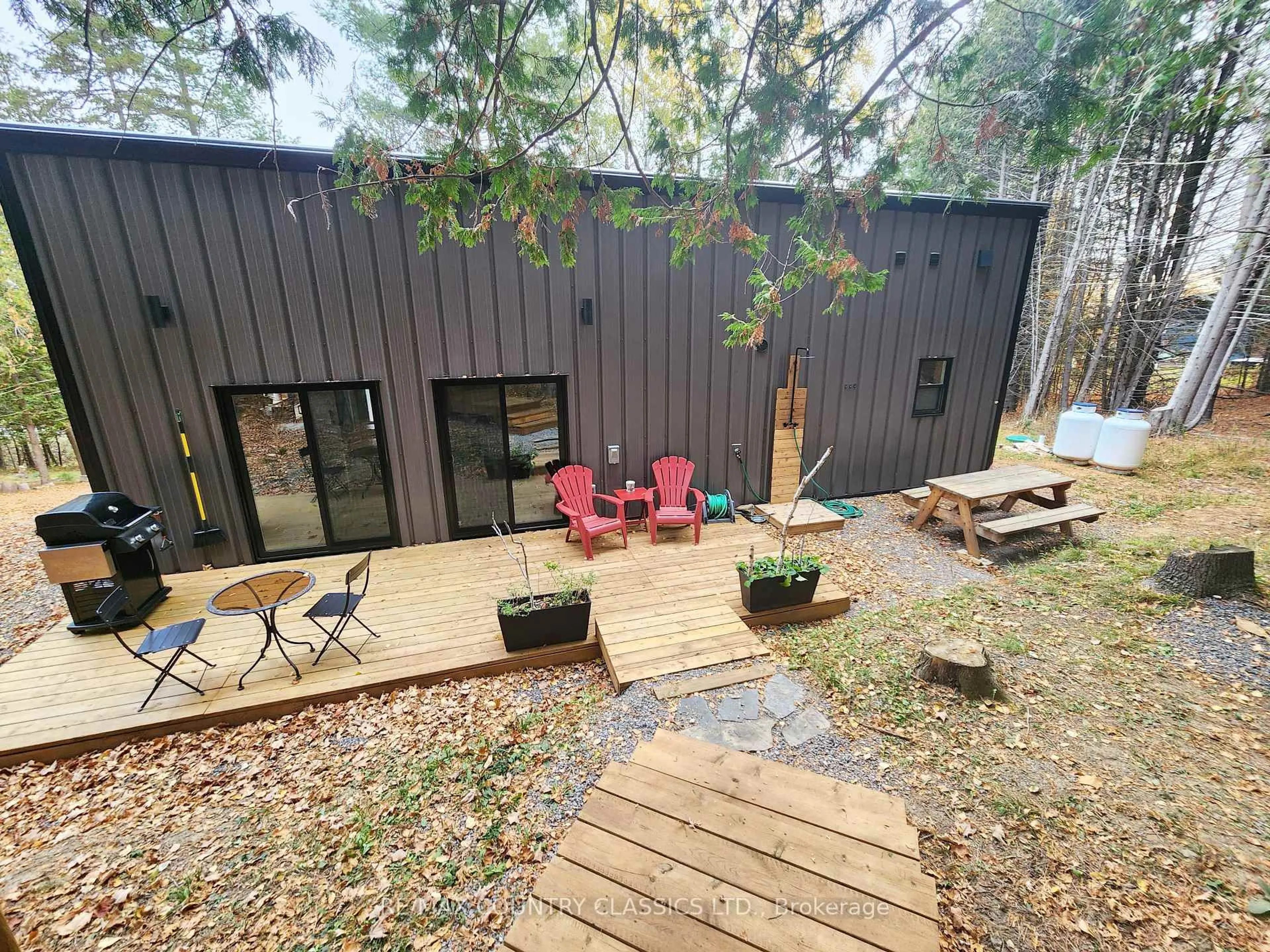A pic from outside/outdoor area/front of a property/back of a property/a pic from drone, forest/trees view for 338 Detlor Rd, Maynooth Ontario K0L 2S0