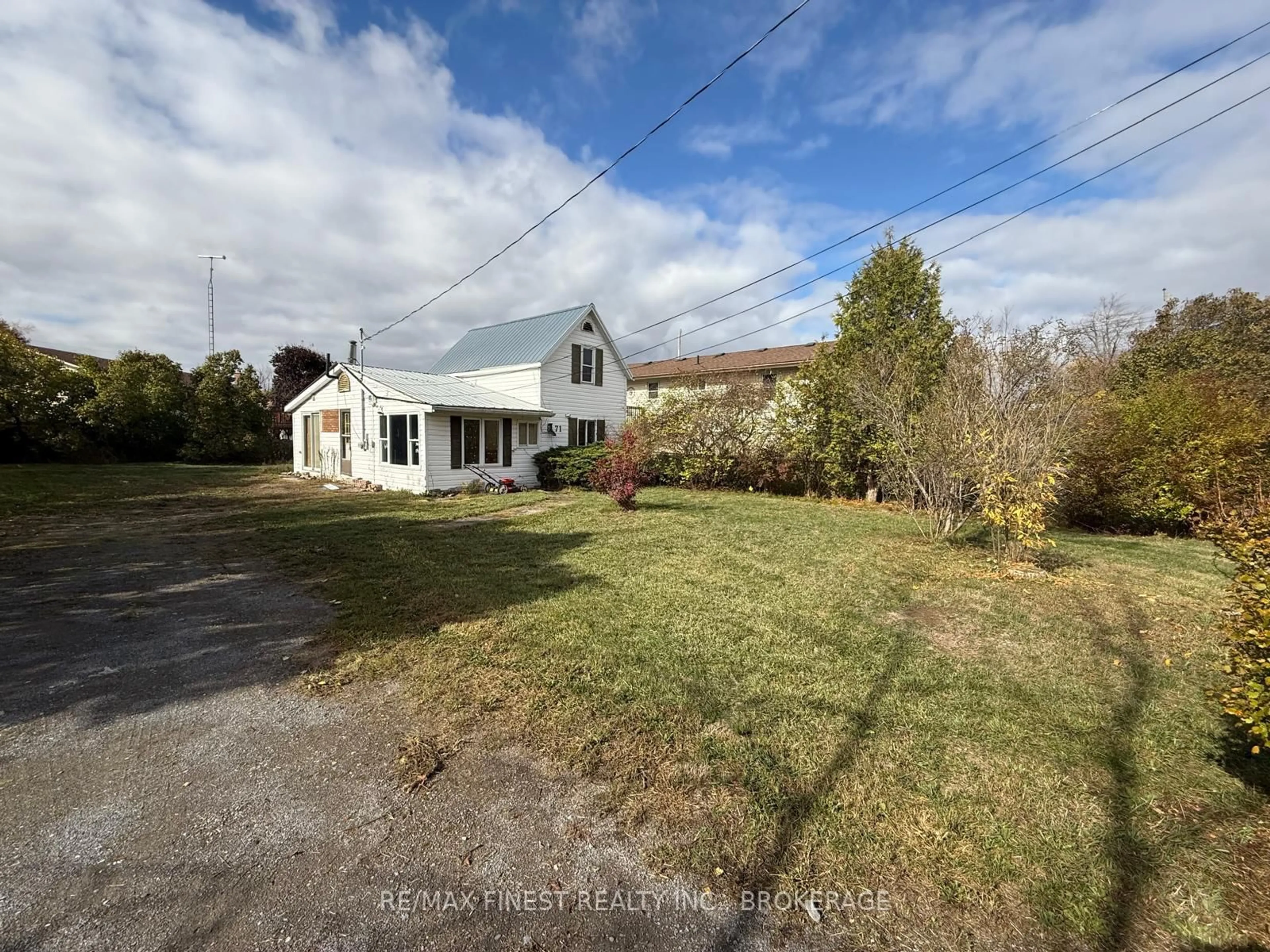 A pic from outside/outdoor area/front of a property/back of a property/a pic from drone, street for 71 Factory St, Bissett Creek Ontario K0H 2H0