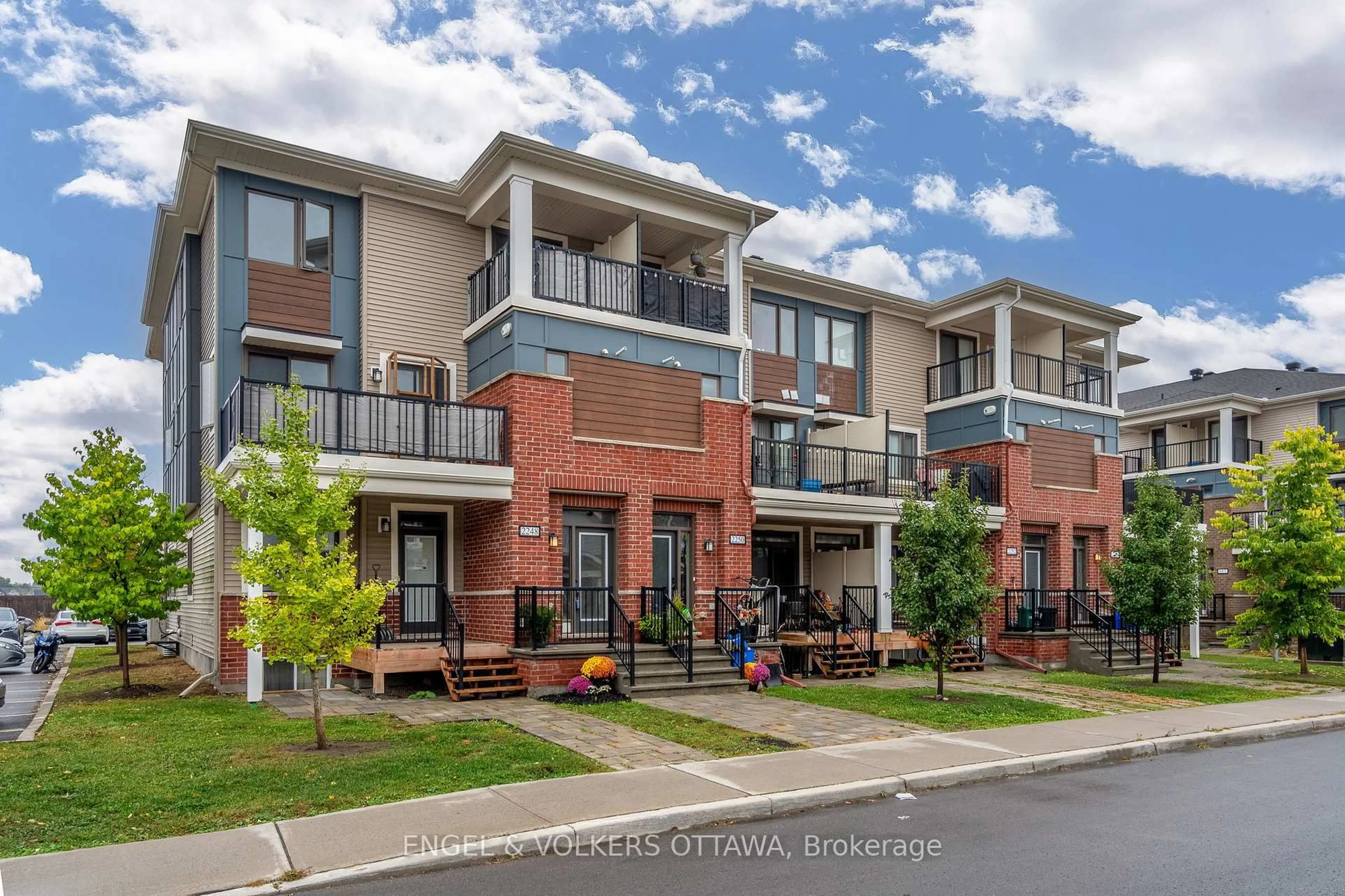 Home with brick exterior material, street for 2248 Watercolours Way #21, Ottawa Ontario K2J 6R2