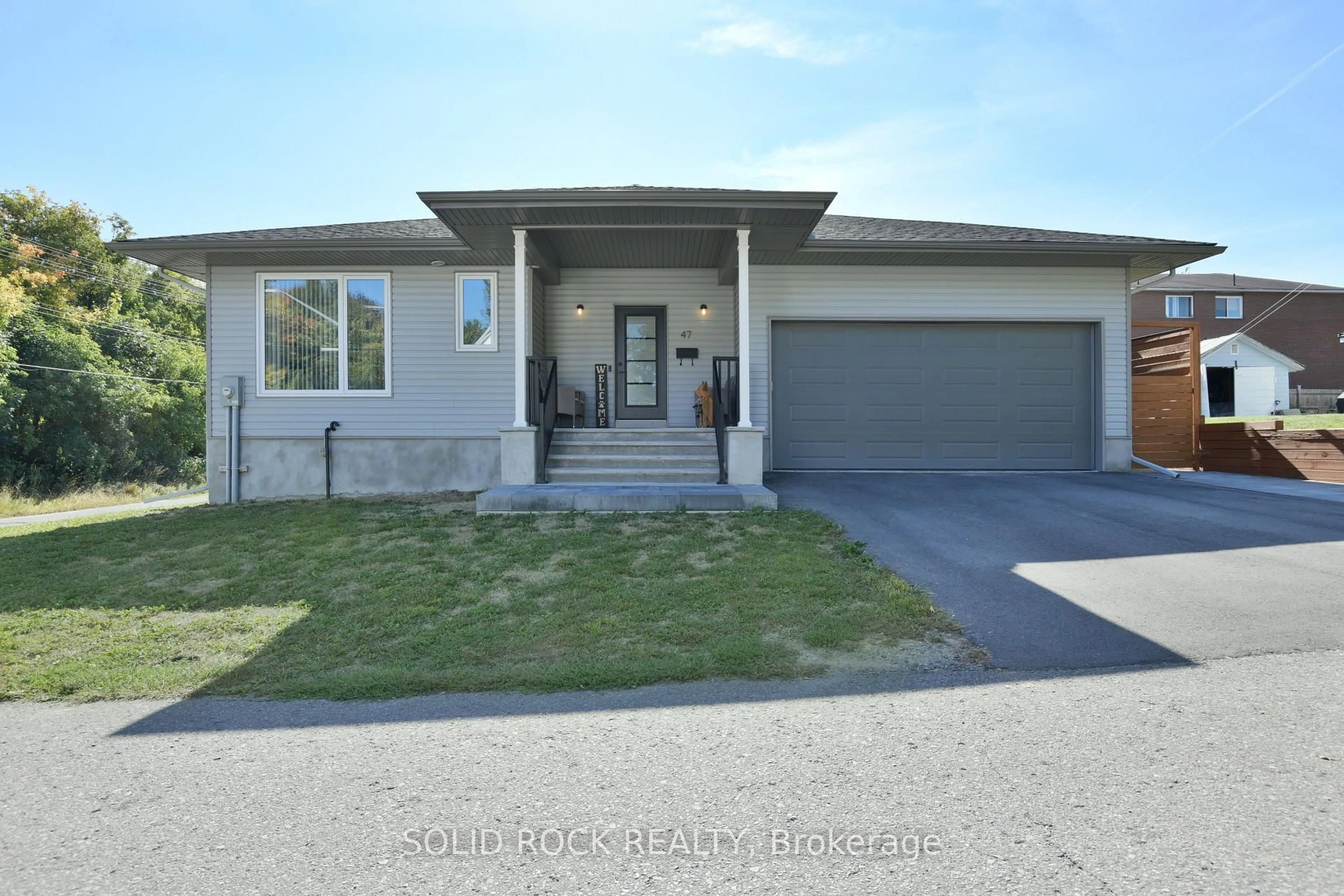 Home with vinyl exterior material, street for 47 Mill Lane, Arnprior Ontario K7S 1L1