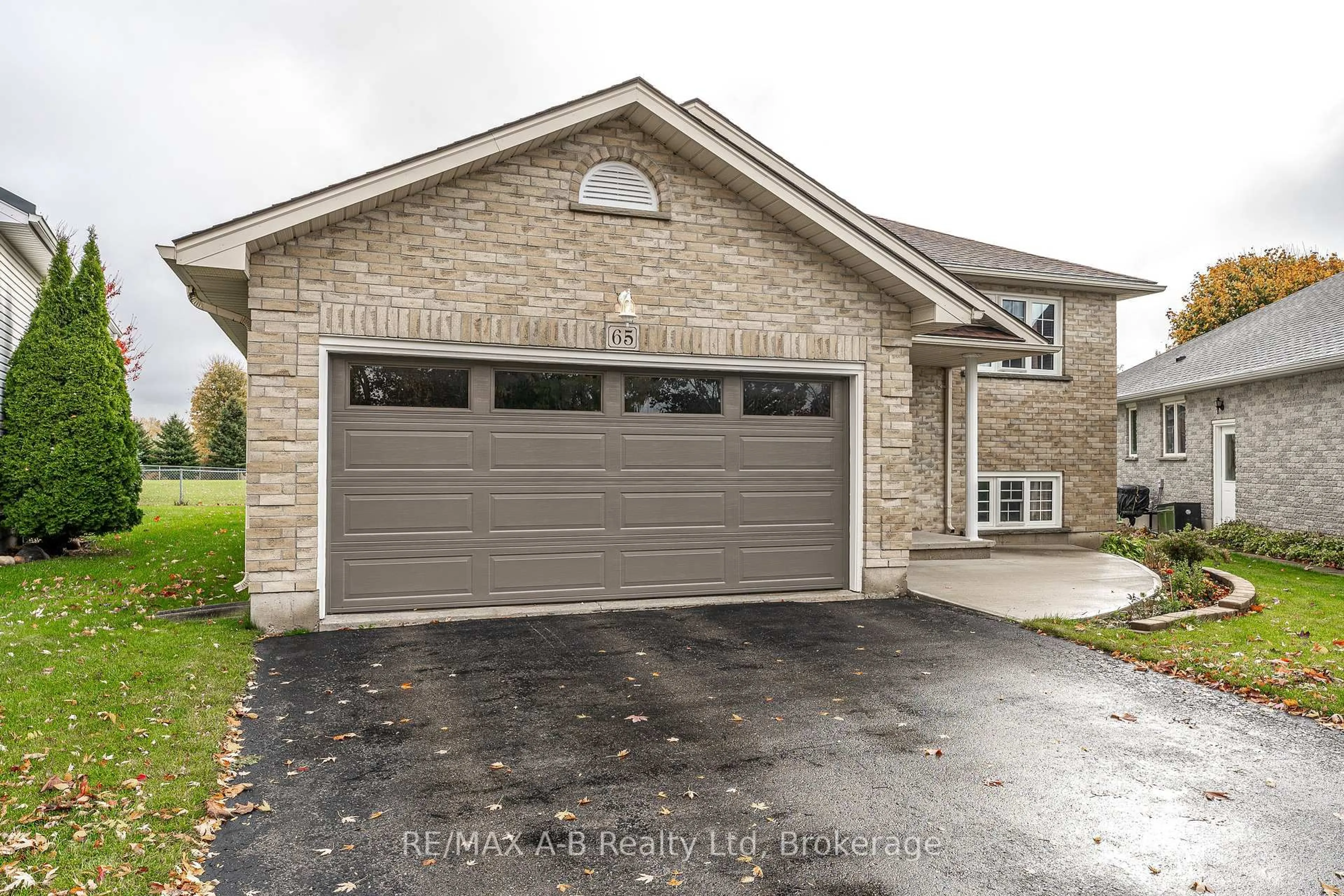 Home with brick exterior material, street for 65 Parkhaven Cres, St. Marys Ontario N4X 1E7