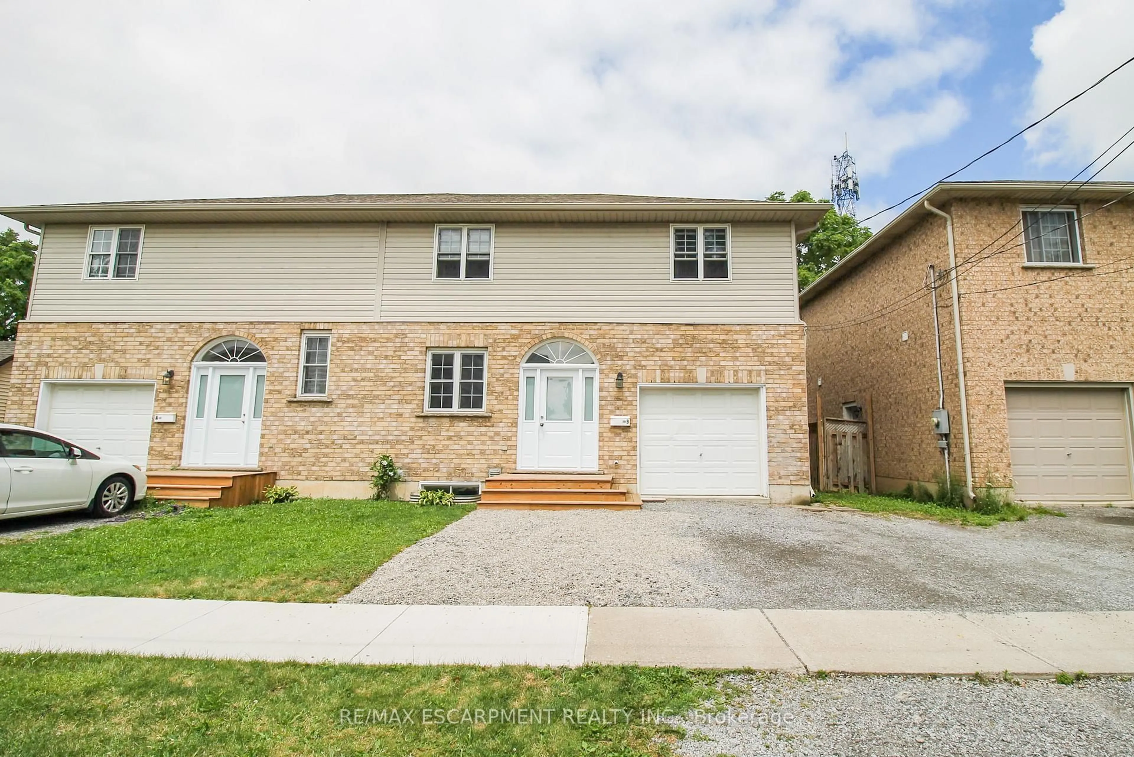 Home with brick exterior material, street for 27B Walnut St, St. Catharines Ontario L2T 1H6