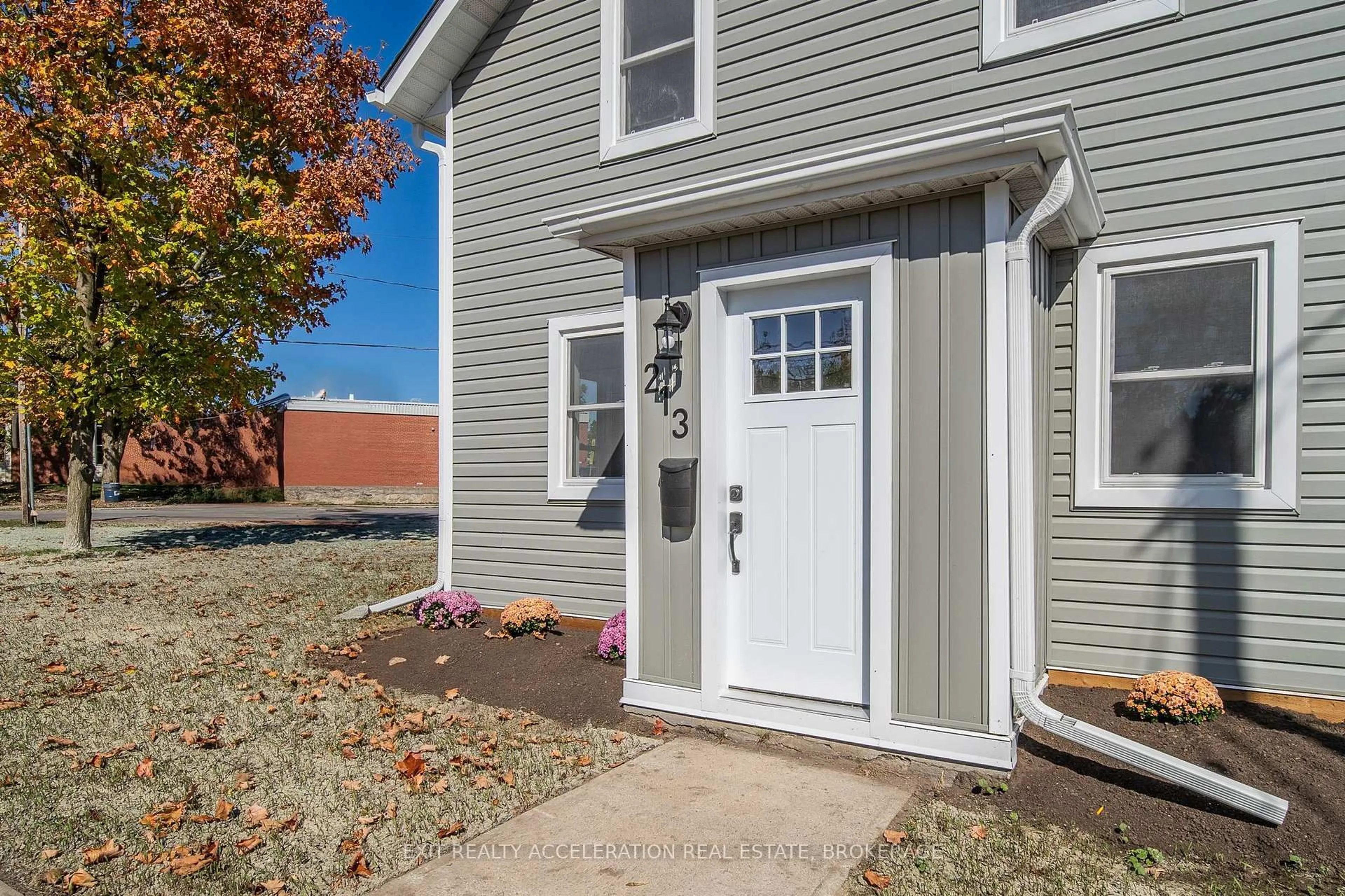 Home with vinyl exterior material, street for 213 Belleville Rd, Greater Napanee Ontario K7R 2R4