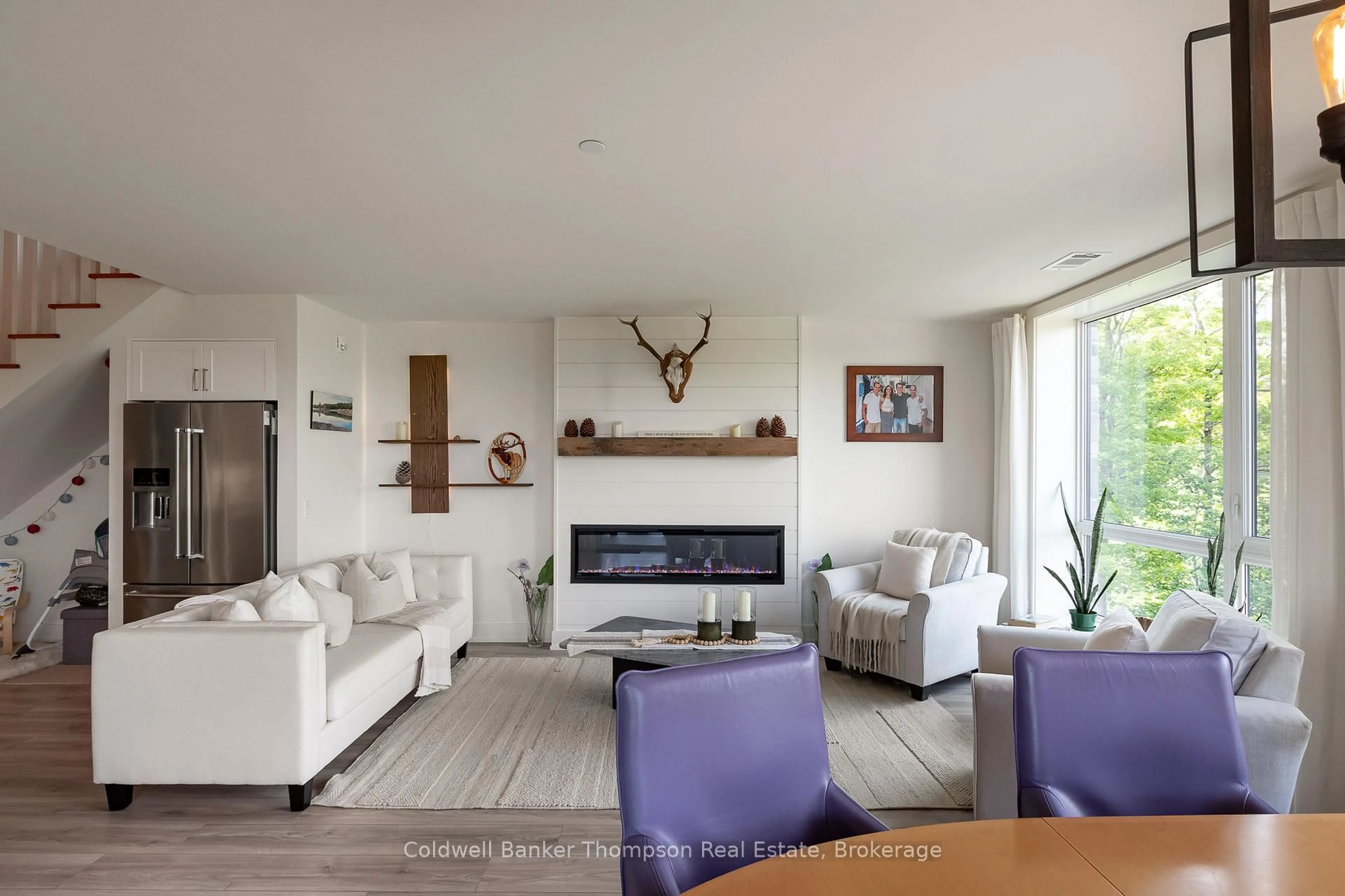 Living room with furniture, unknown for 18 Campus Tr #403, Huntsville Ontario P1H 0K2