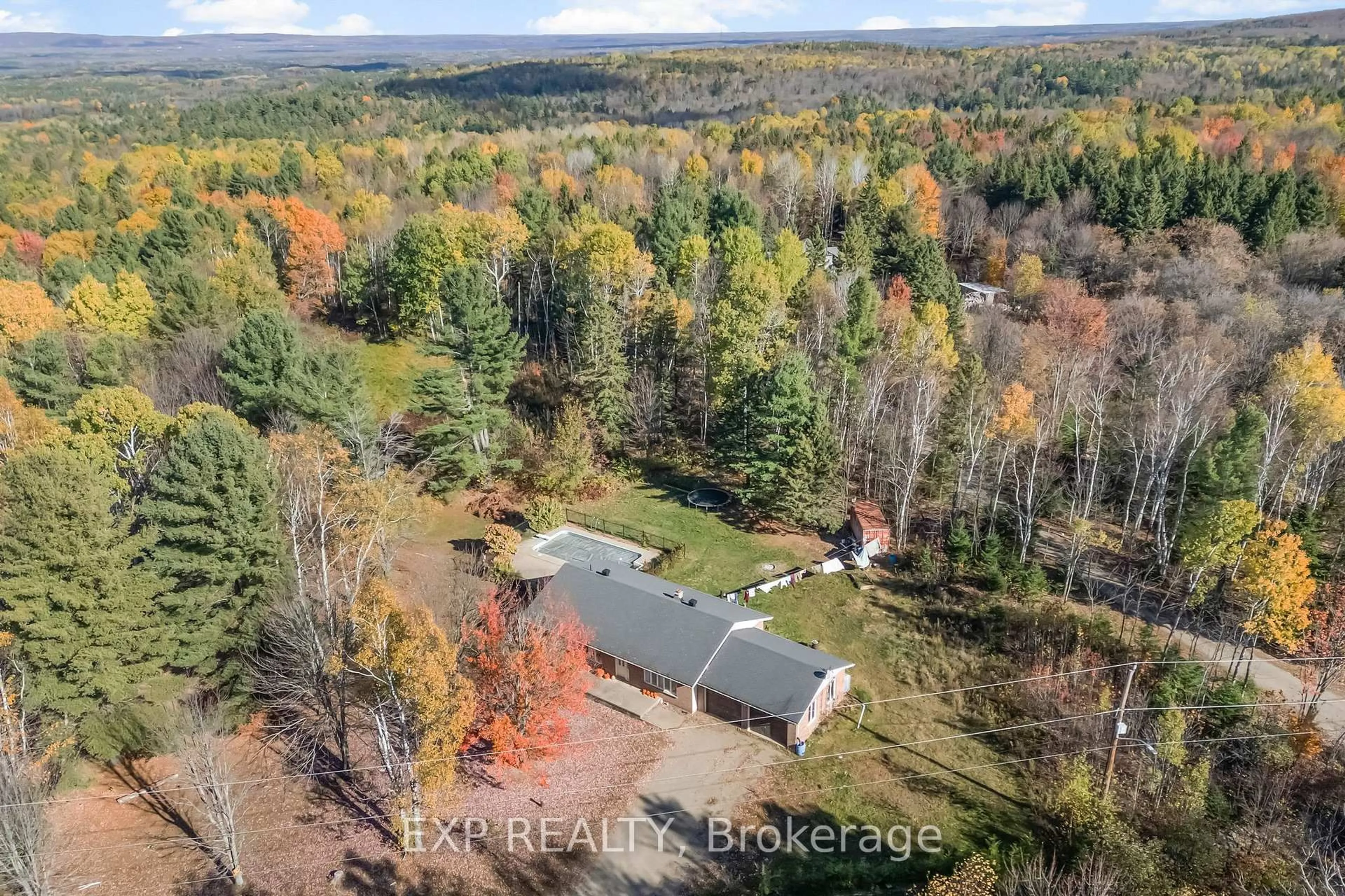 A pic from outside/outdoor area/front of a property/back of a property/a pic from drone, forest/trees view for 91 Hillcrest Ave, Wilno Ontario K0J 2N0