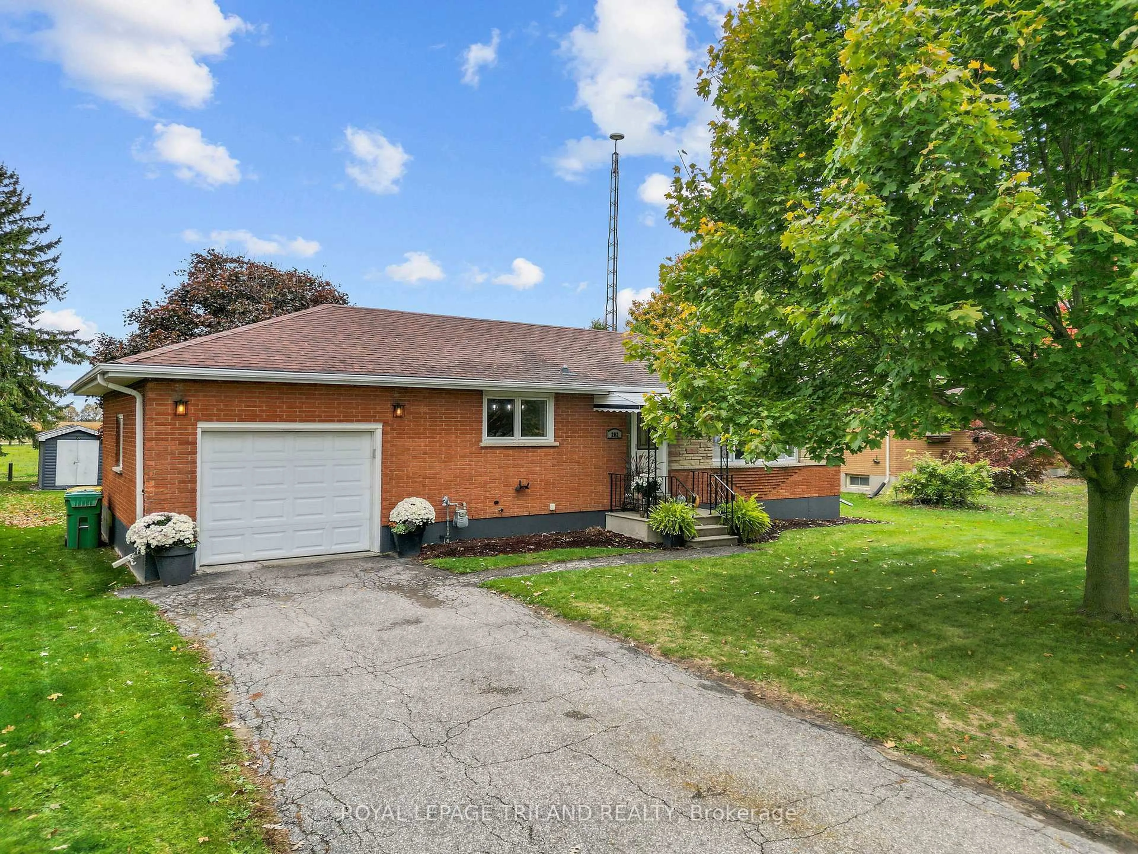Home with brick exterior material, street for 202 Appin Rd, Southwest Middlesex Ontario N0L 1M0
