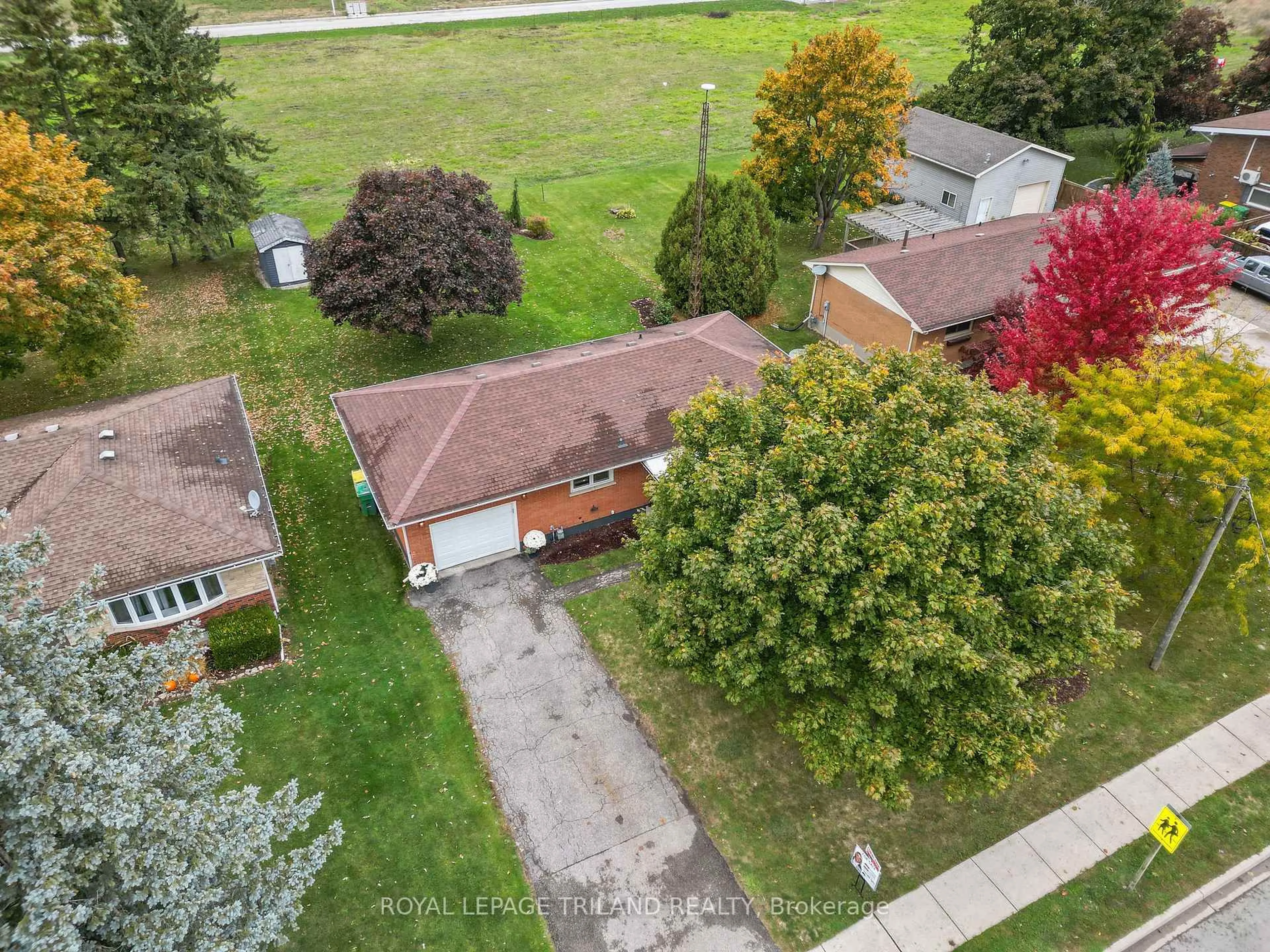 A pic from outside/outdoor area/front of a property/back of a property/a pic from drone, street for 202 Appin Rd, Southwest Middlesex Ontario N0L 1M0