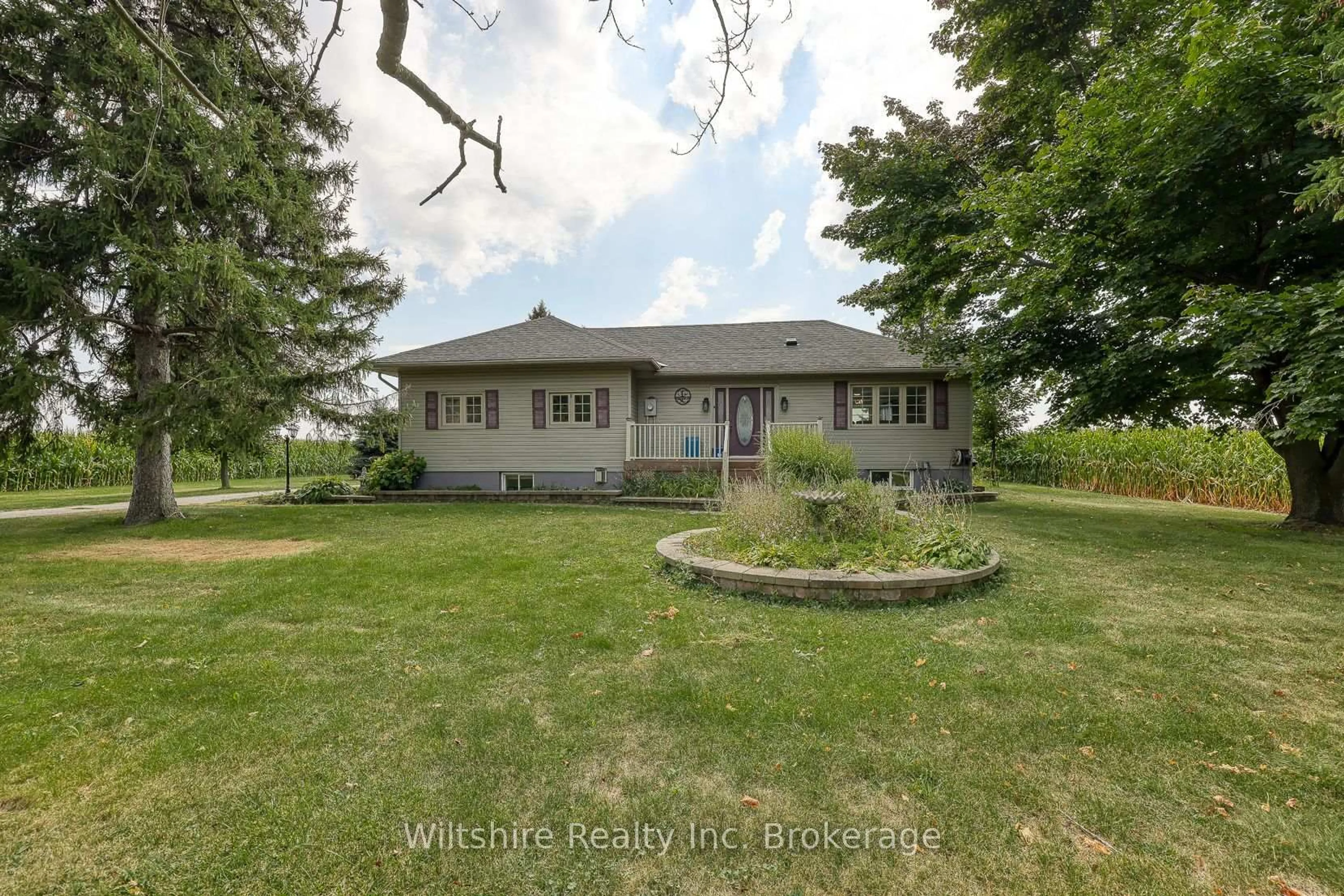 A pic from outside/outdoor area/front of a property/back of a property/a pic from drone, unknown for 47209 Talbot Line, Malahide Ontario N5P 3S7