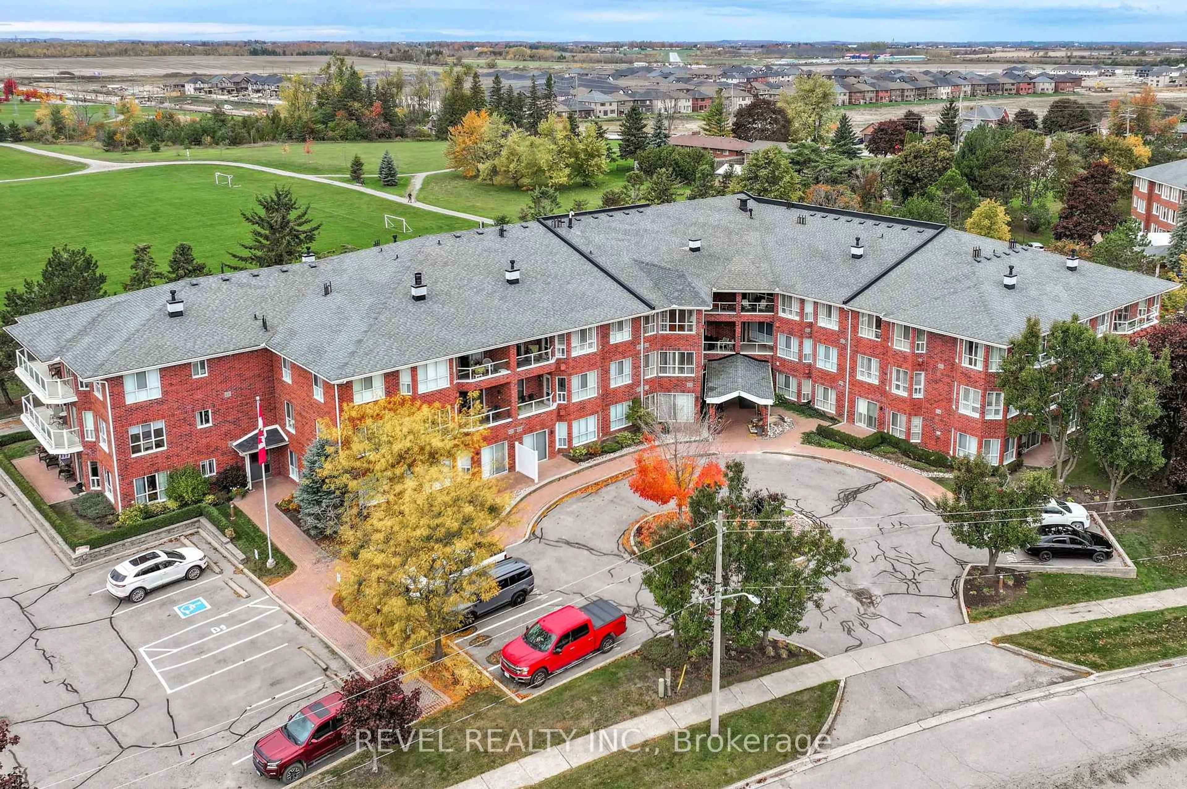 A pic from outside/outdoor area/front of a property/back of a property/a pic from drone, unknown for 3 Heritage Way #306, Kawartha Lakes Ontario K9V 5Z1