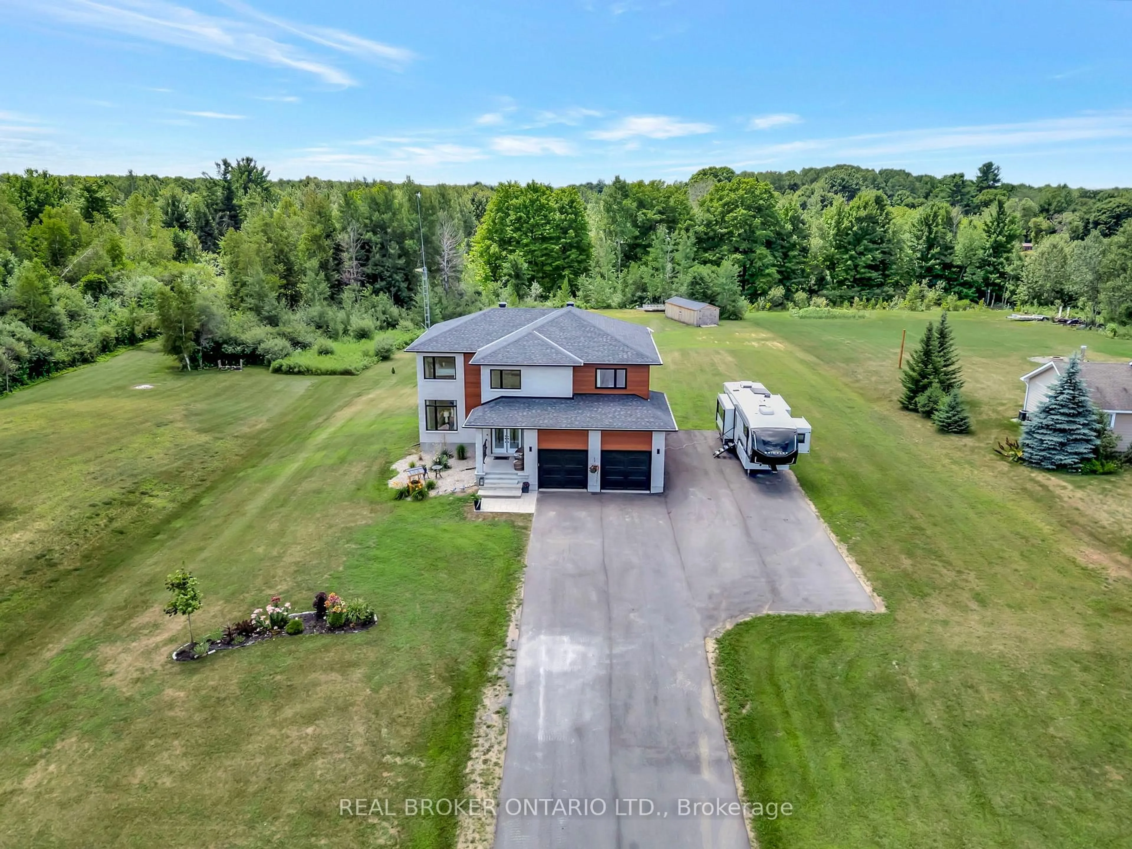 A pic from outside/outdoor area/front of a property/back of a property/a pic from drone, water/lake/river/ocean view for 114 Smith Rd, North Grenville Ontario K0G 1T0