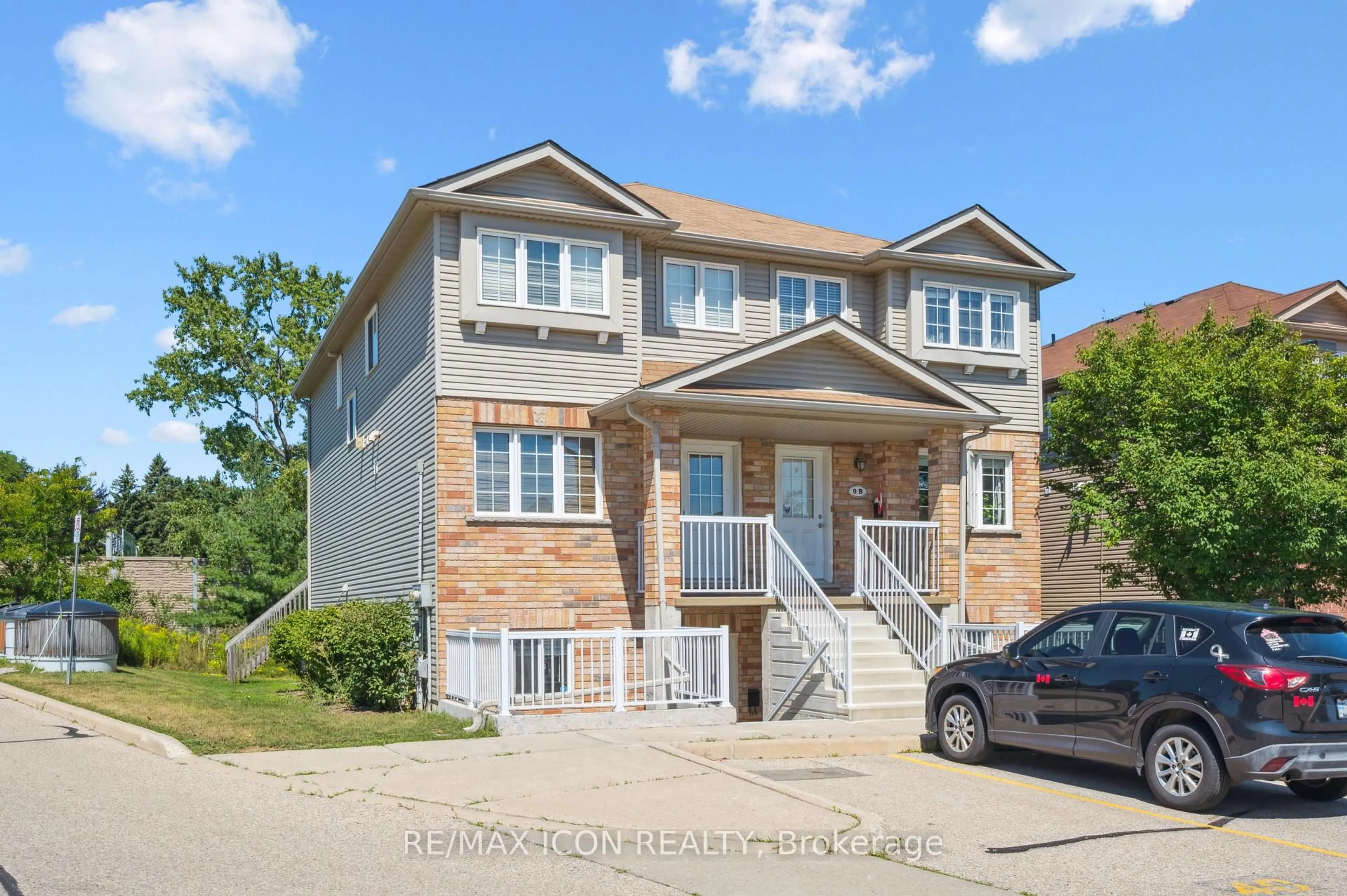Home with brick exterior material, street for 50 Howe Dr #9D, Kitchener Ontario N2E 0A3