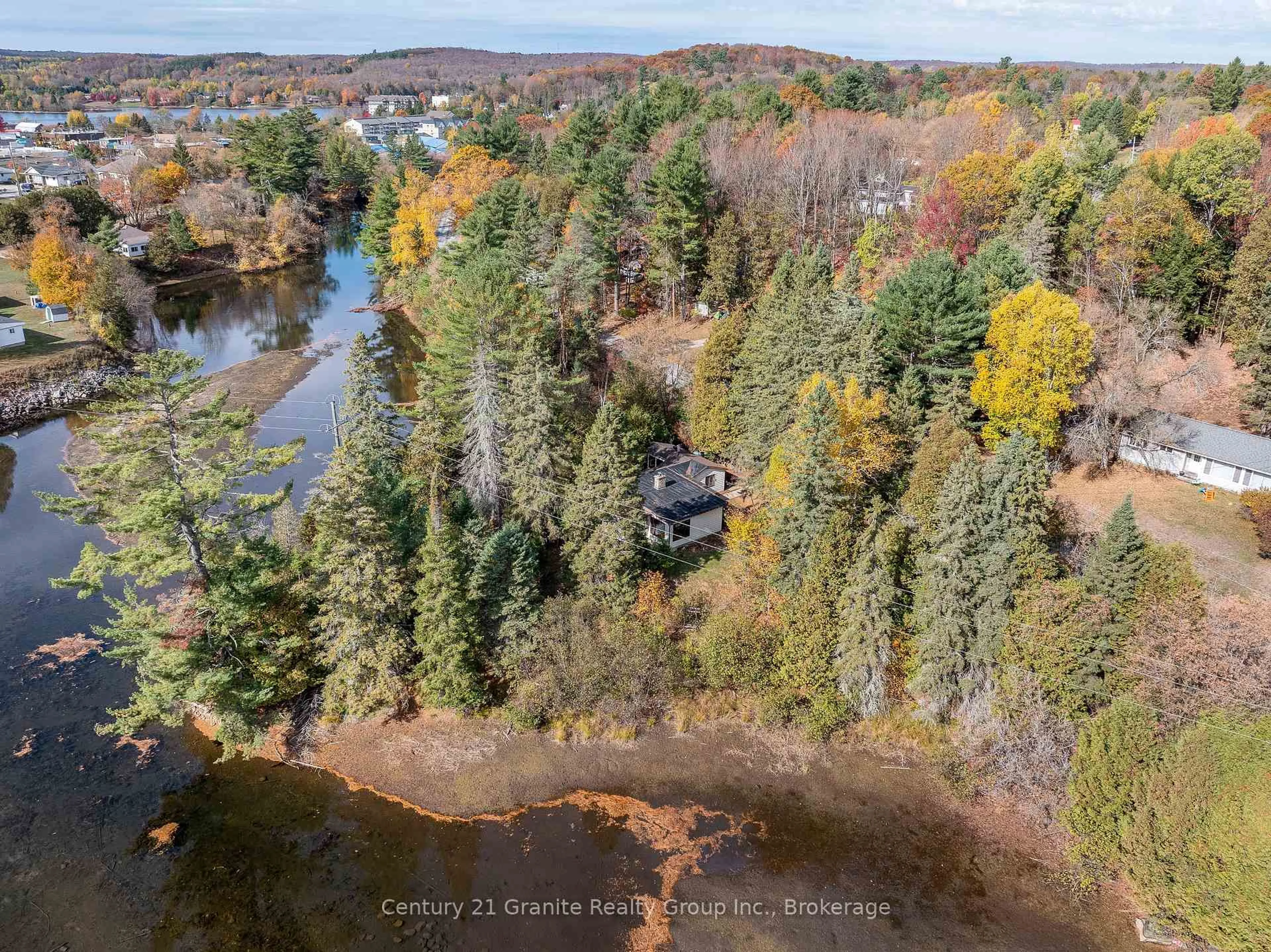 A pic from outside/outdoor area/front of a property/back of a property/a pic from drone, water/lake/river/ocean view for 50 Riverside Dr, Dysart et al Ontario K0M 1S0