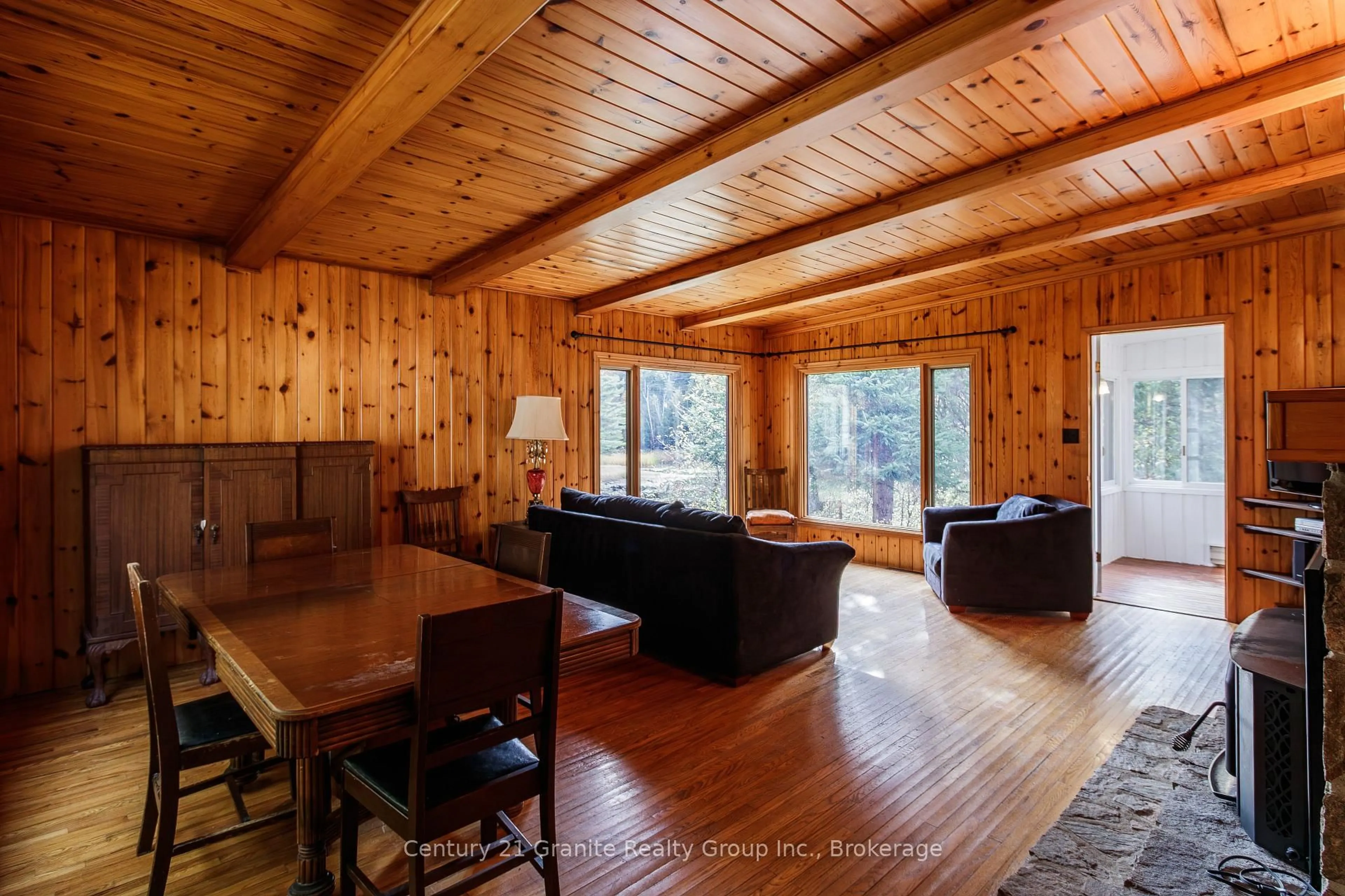 Living room with furniture, wood/laminate floor for 50 Riverside Dr, Dysart et al Ontario K0M 1S0