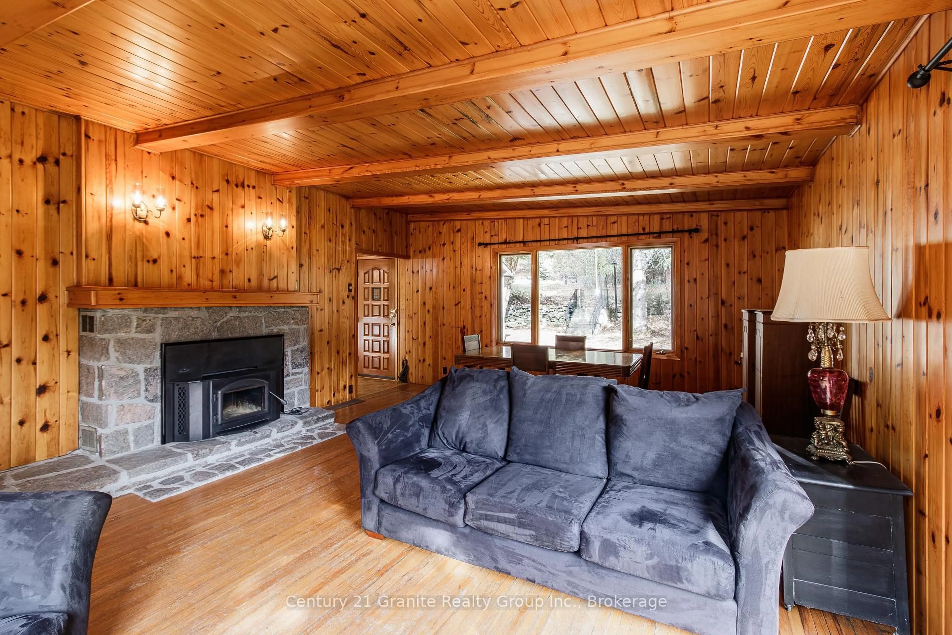 Living room with furniture, wood/laminate floor for 50 Riverside Dr, Dysart et al Ontario K0M 1S0