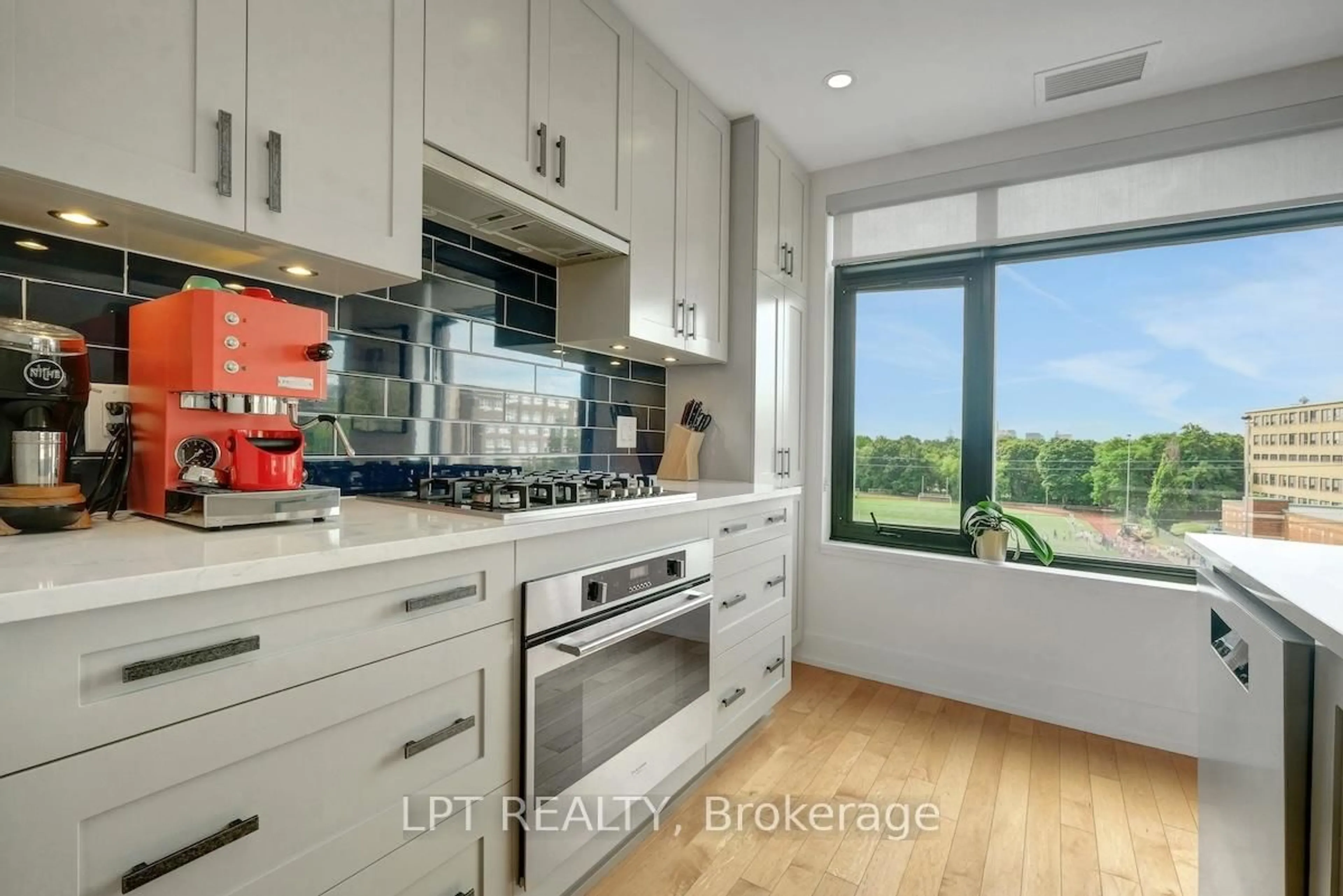 Contemporary kitchen, ceramic/tile floor for 60 Springhurst Ave #504, Ottawa Ontario K1S 5V7
