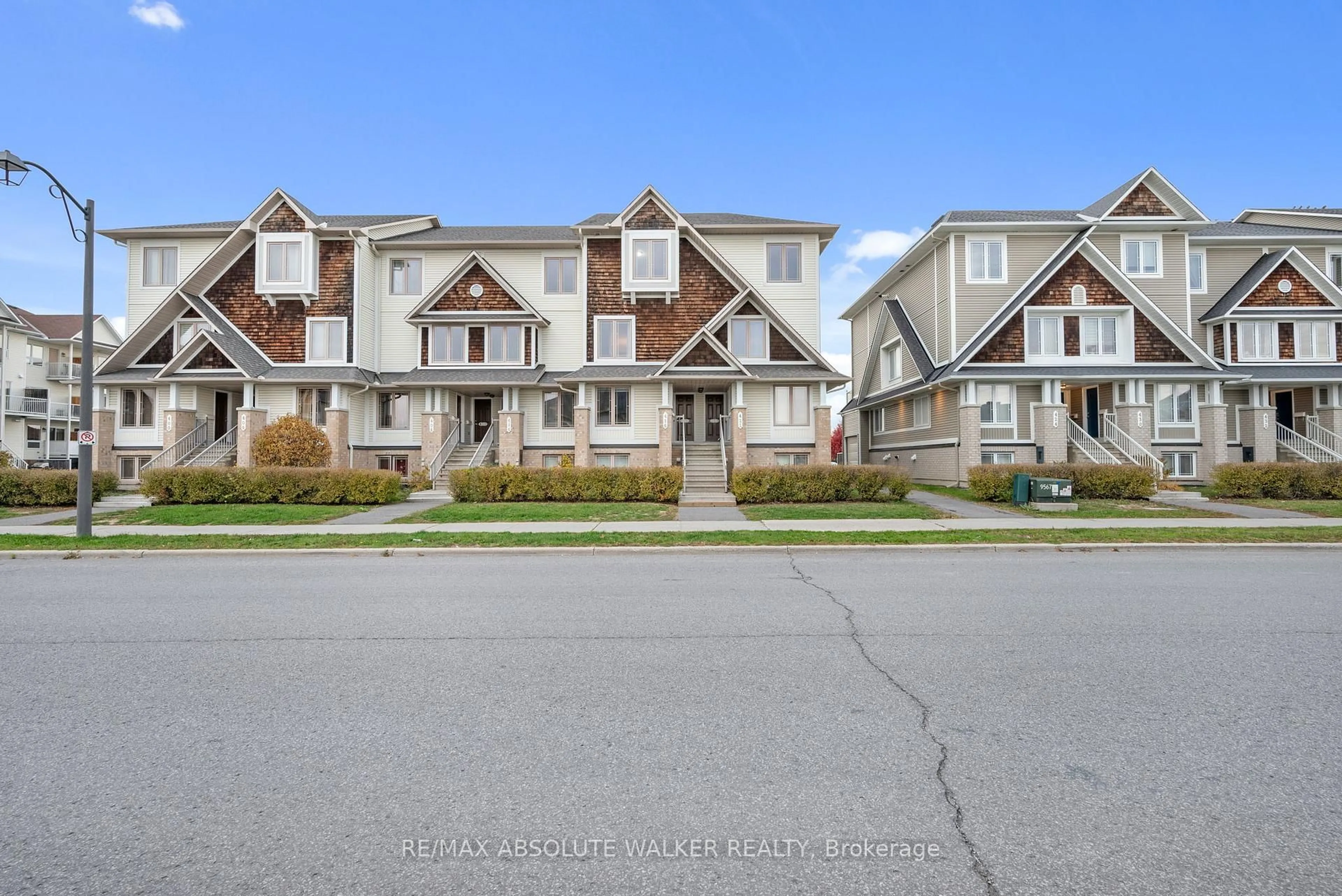 A pic from outside/outdoor area/front of a property/back of a property/a pic from drone, street for 418 Harvest Valley Ave #53, Ottawa Ontario K4A 0V6