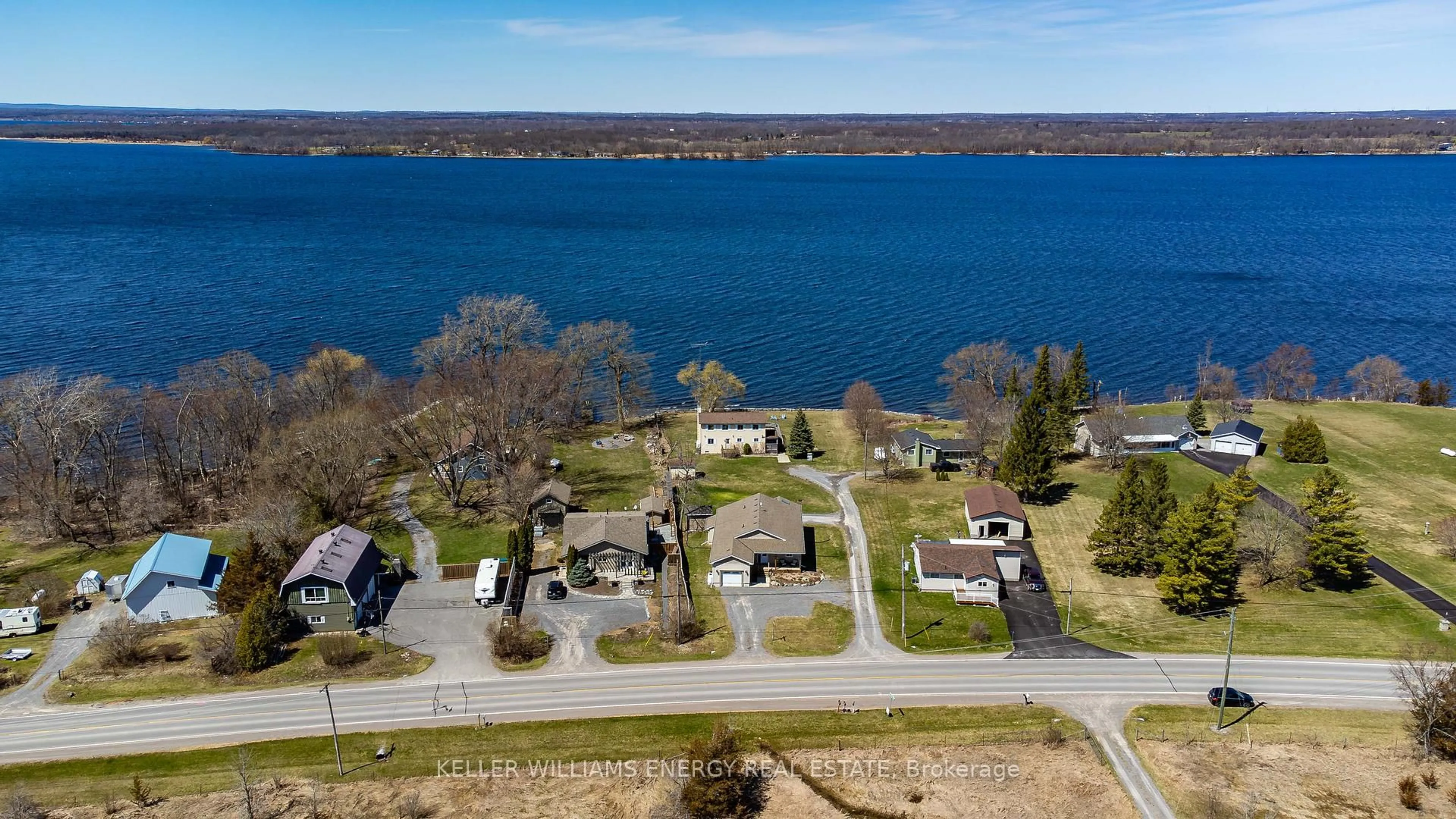 A pic from outside/outdoor area/front of a property/back of a property/a pic from drone, water/lake/river/ocean view for 1649 County Road 15, Prince Edward County Ontario K0K 1W0