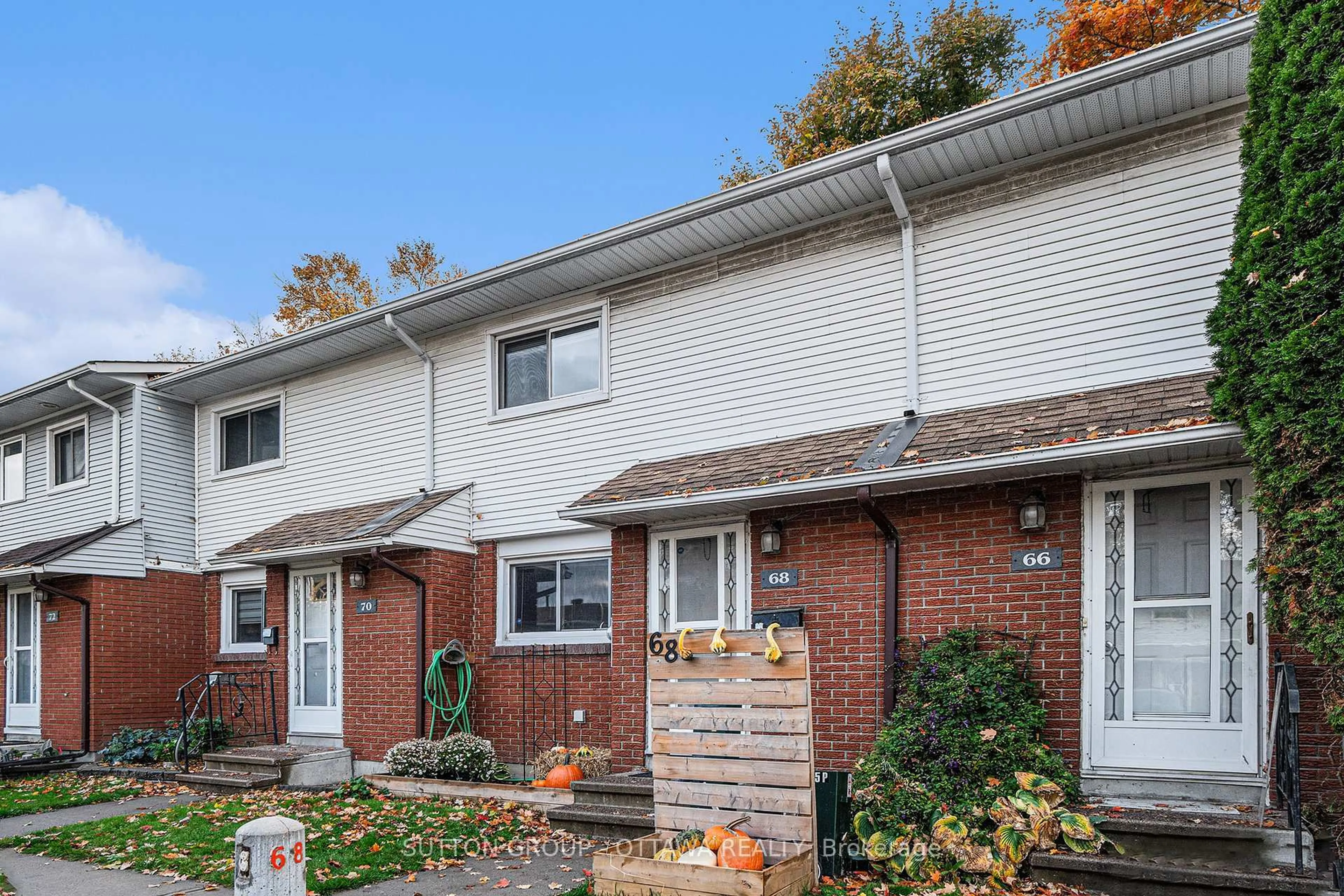 Home with brick exterior material, street for 1045 Morrison Dr #68, Ottawa Ontario K2H 7L2