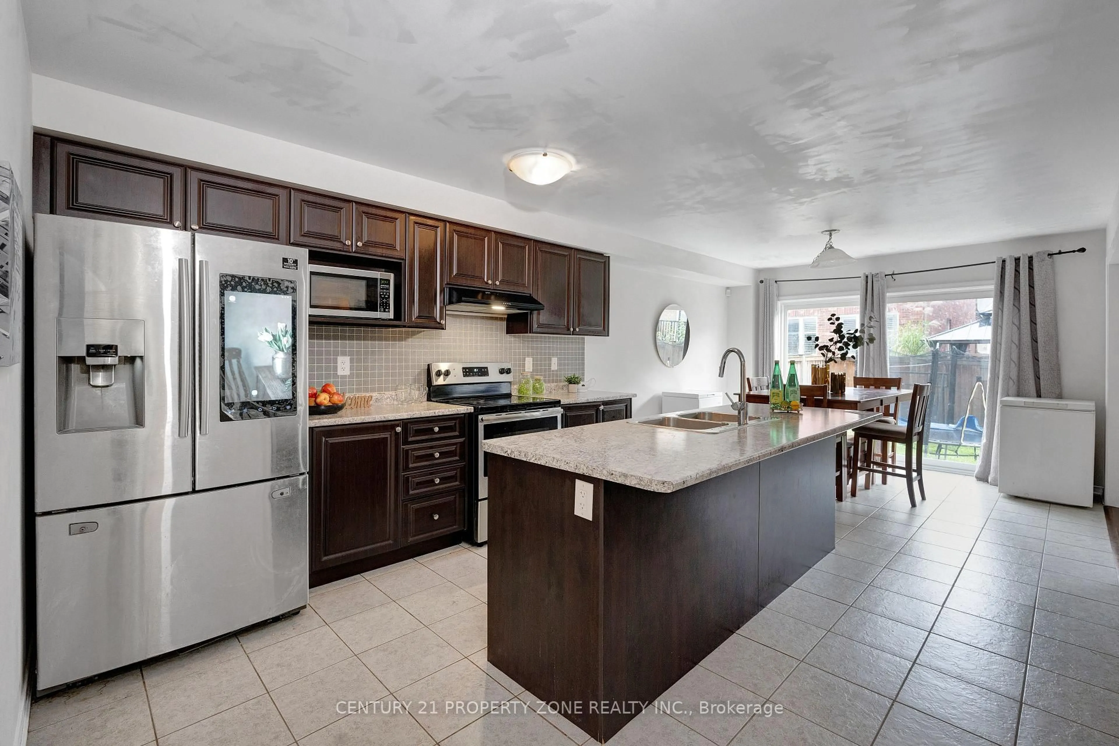 Open concept kitchen, ceramic/tile floor for 43 Mccargow Dr, Haldimand Ontario N3W 0C3
