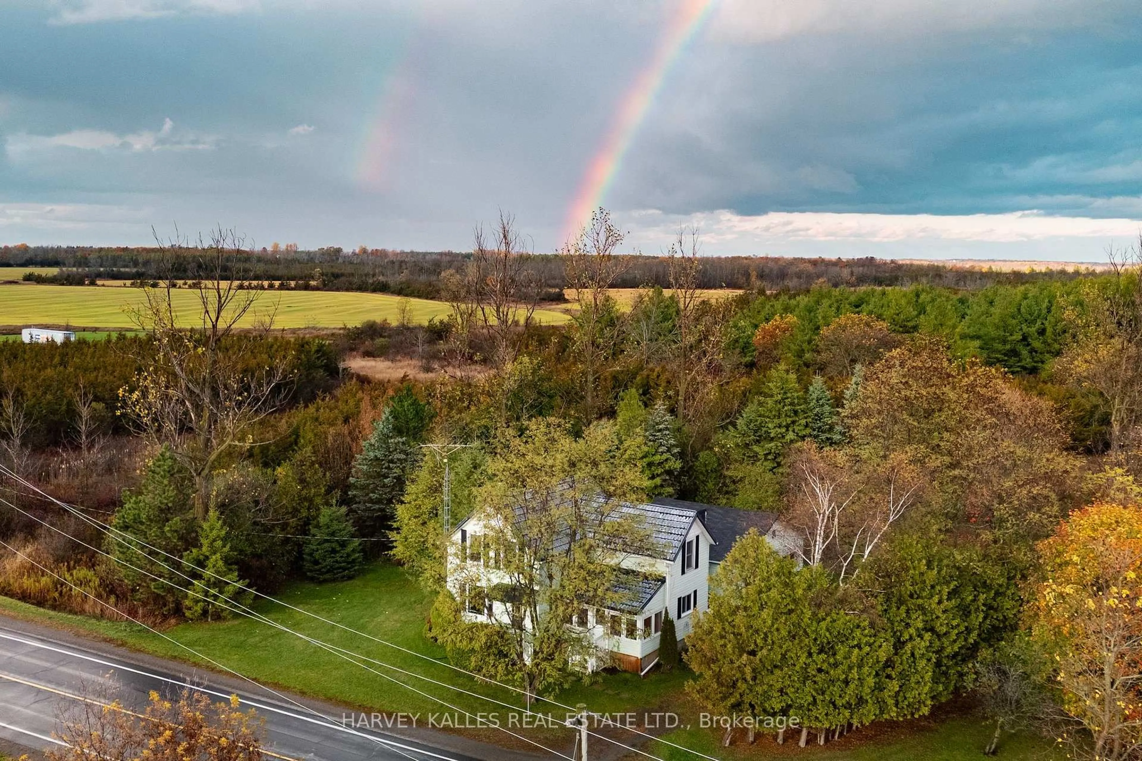 A pic from outside/outdoor area/front of a property/back of a property/a pic from drone, water/lake/river/ocean view for 2068 County Road 5 Rd, Prince Edward County Ontario K0K 2T0
