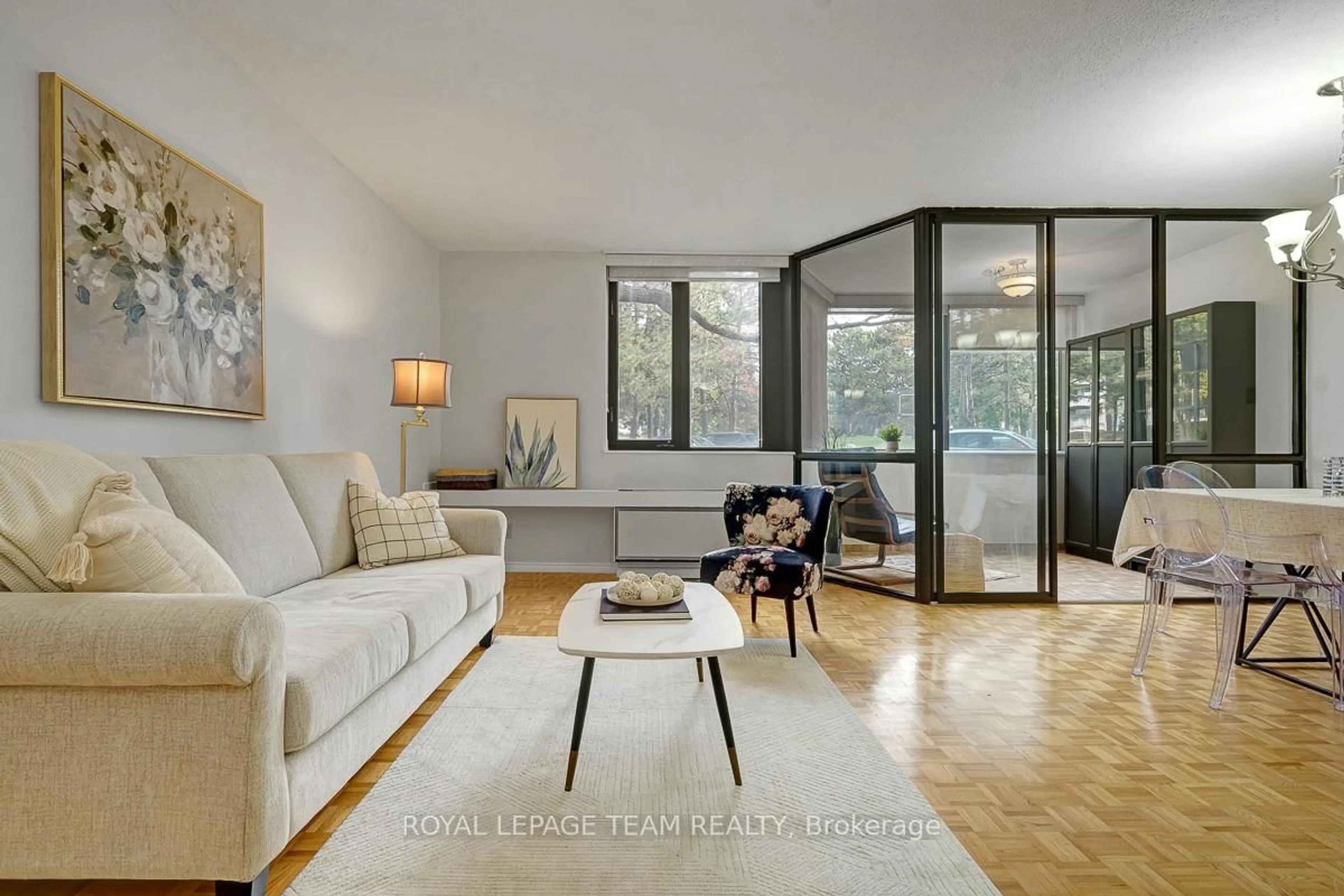 Living room with furniture, unknown for 2871 Richmond Rd #411, Ottawa Ontario K2B 8M5