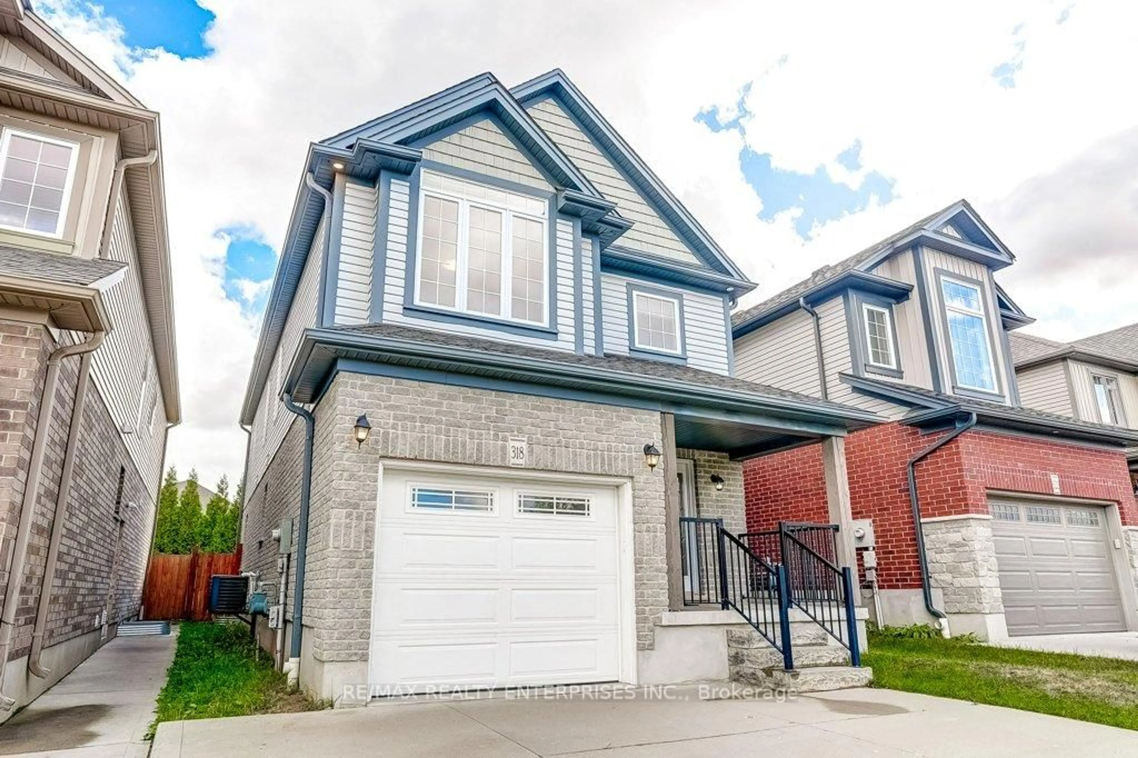 Home with brick exterior material, street for 318 Old Huron Rd, Kitchener Ontario N2R 1P8