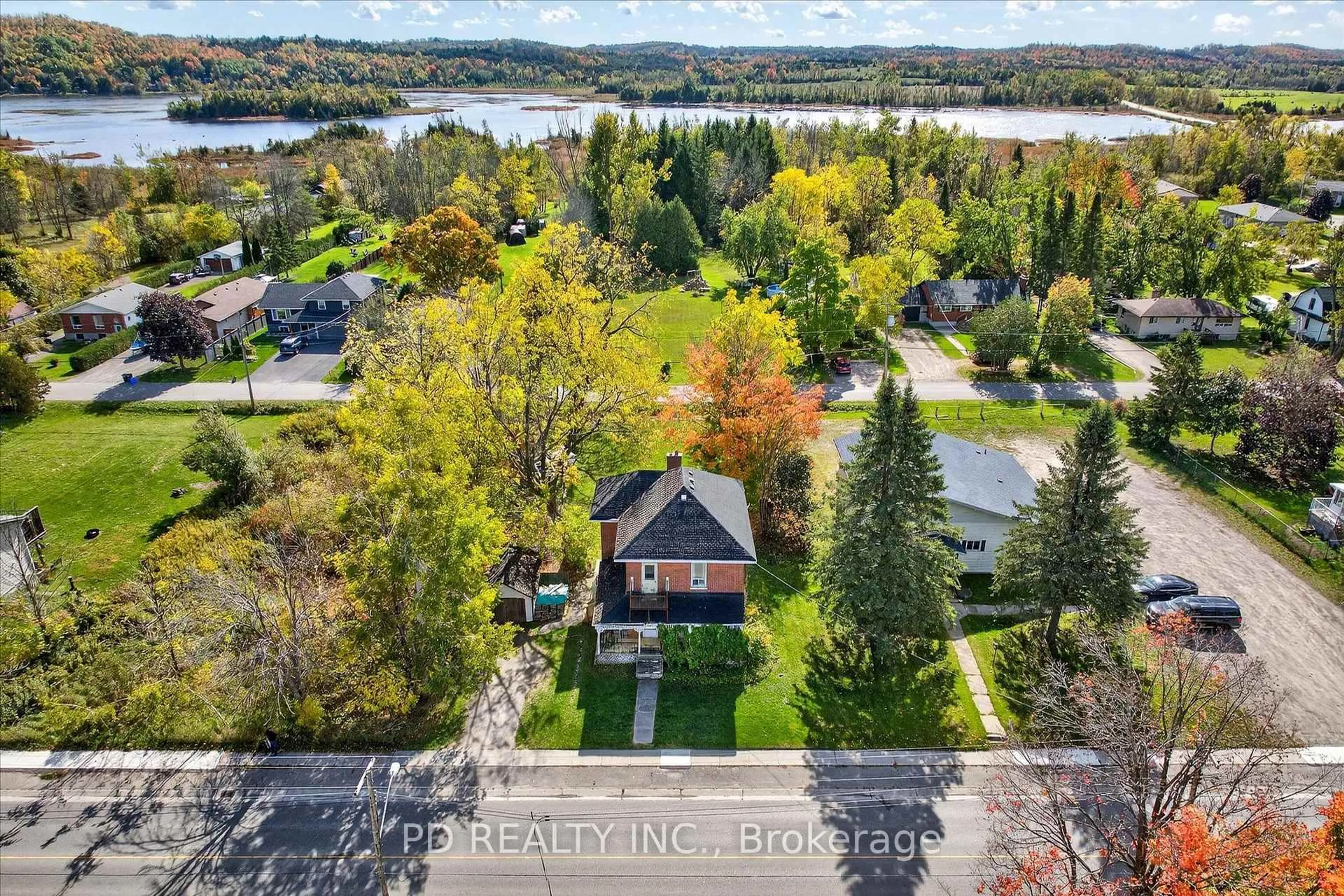 A pic from outside/outdoor area/front of a property/back of a property/a pic from drone, water/lake/river/ocean view for 64 King St, Kawartha Lakes Ontario K0L 2W0