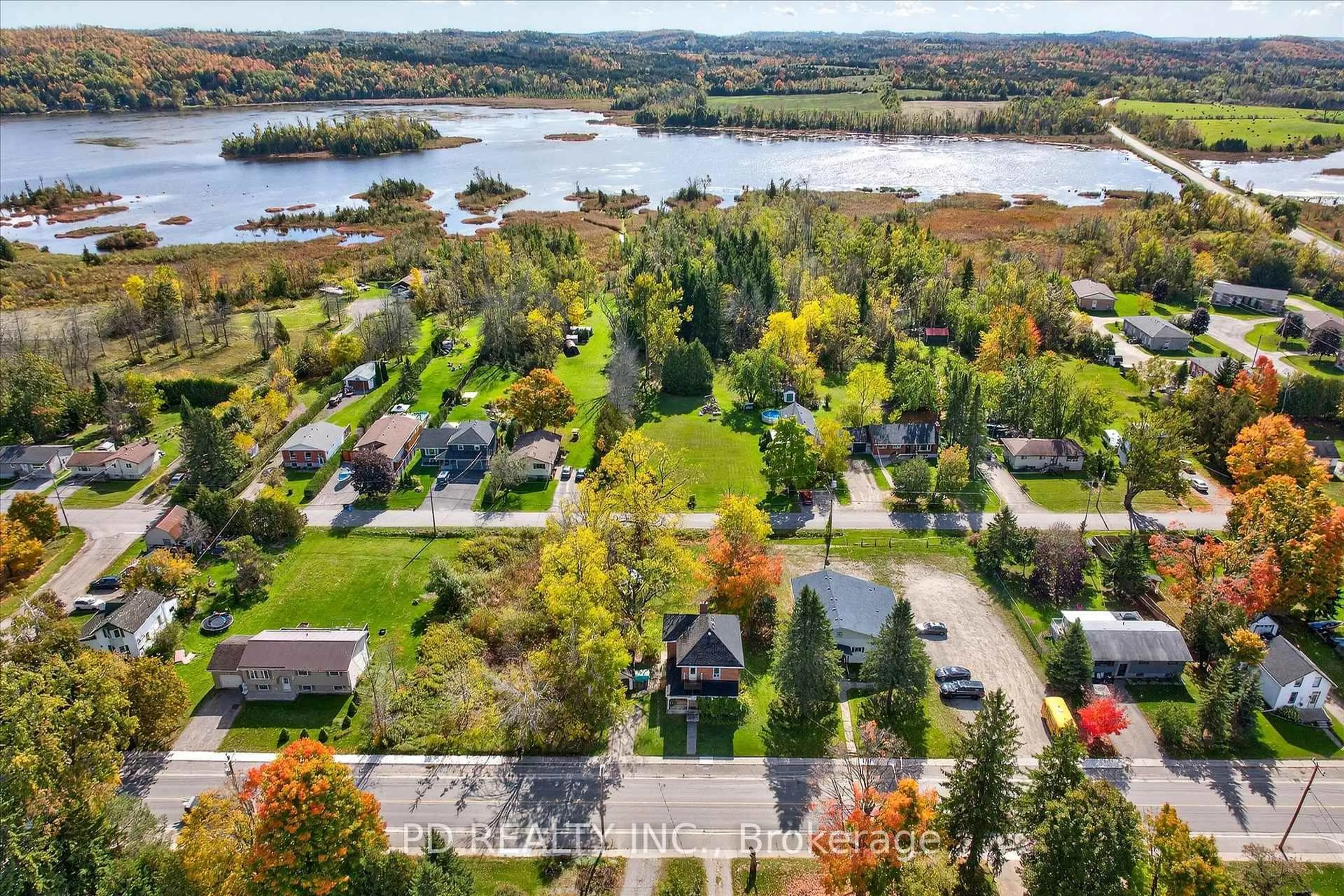 A pic from outside/outdoor area/front of a property/back of a property/a pic from drone, water/lake/river/ocean view for 64 King St, Kawartha Lakes Ontario K0L 2W0