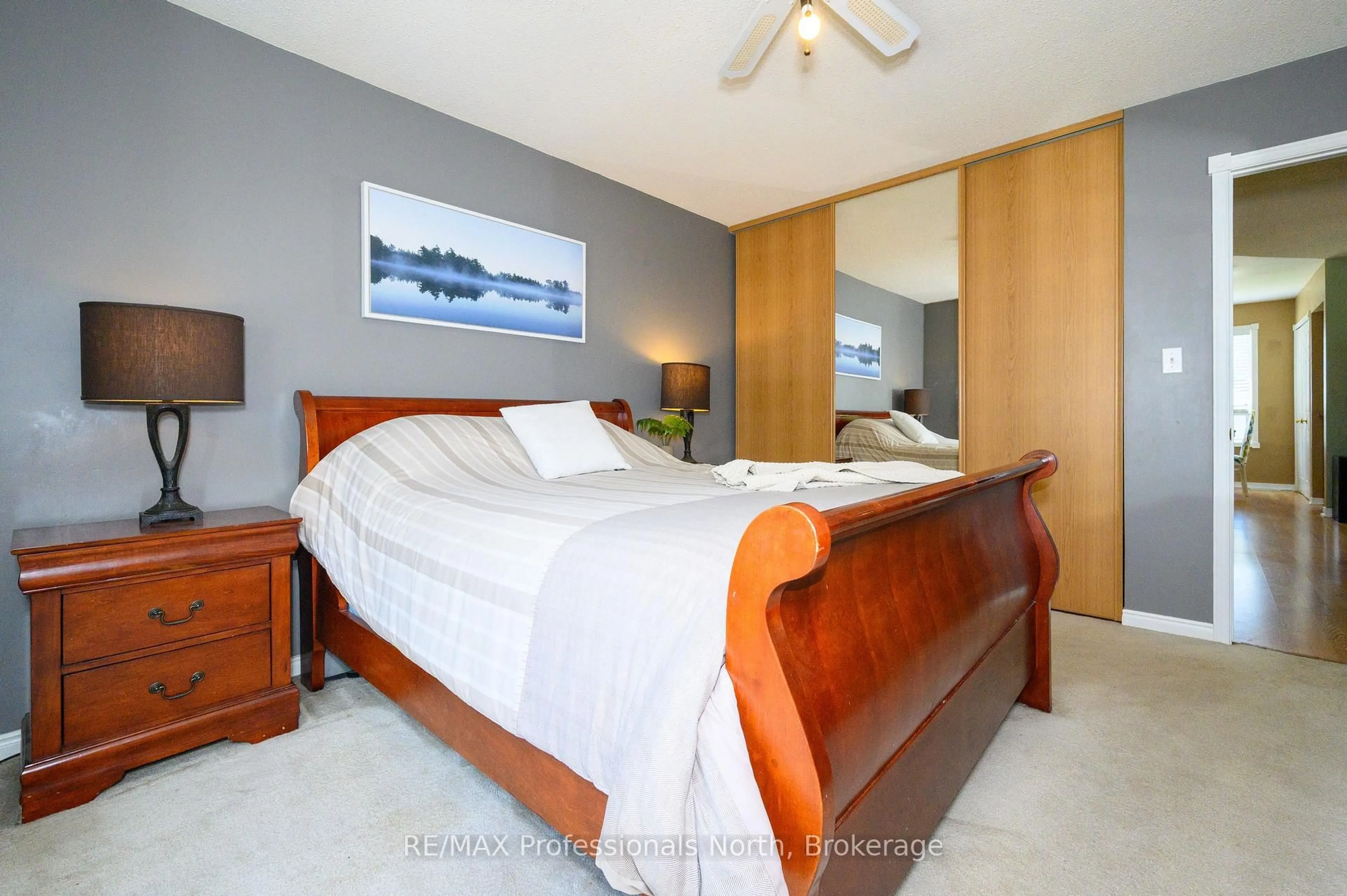 Bedroom with bed, wood/laminate floor for 30 Sabrina Park Dr, Huntsville Ontario P1H 1L8