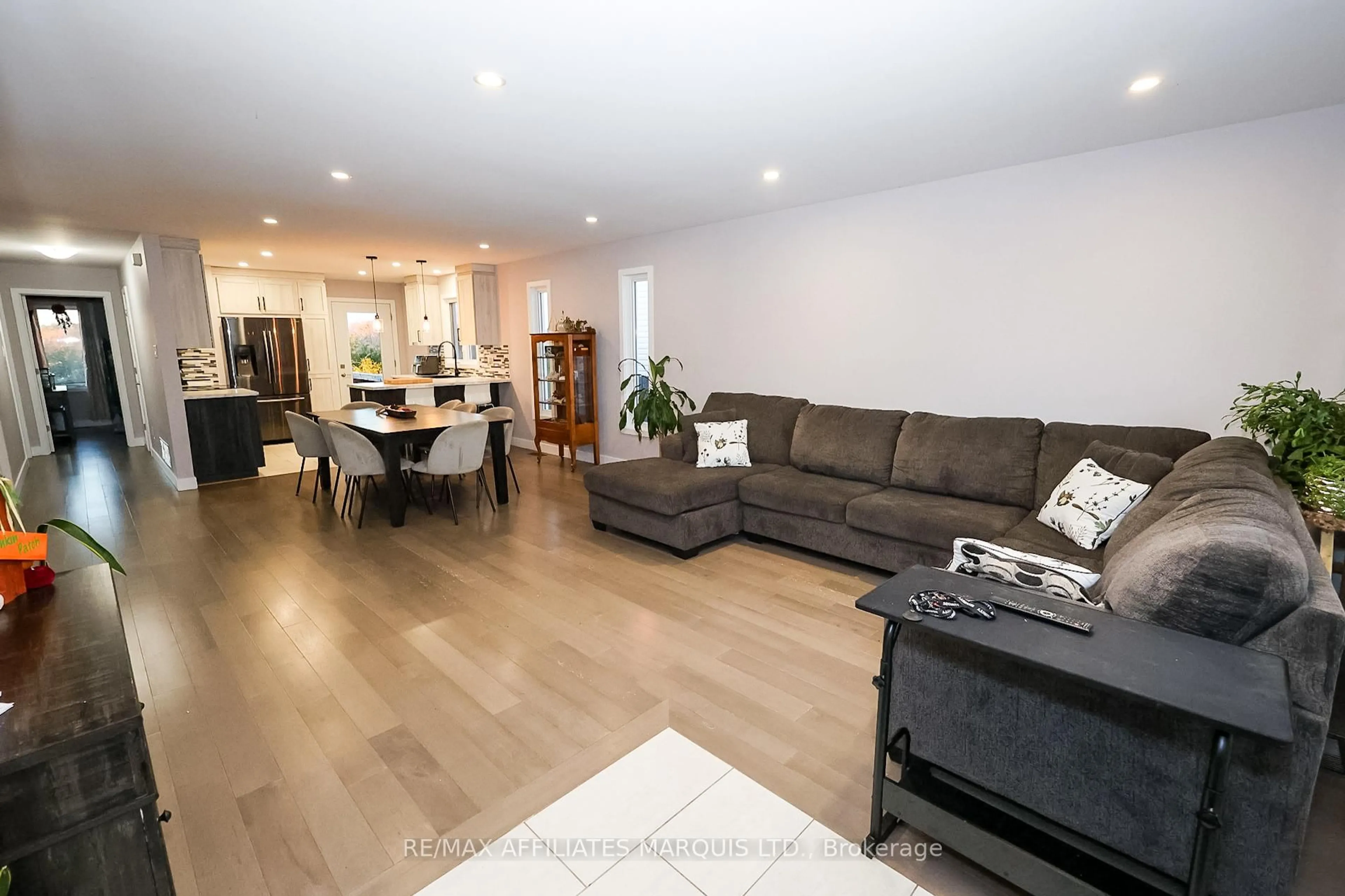 Living room with furniture, wood/laminate floor for 310 Moisson St, Russell Ontario K0A 1W0