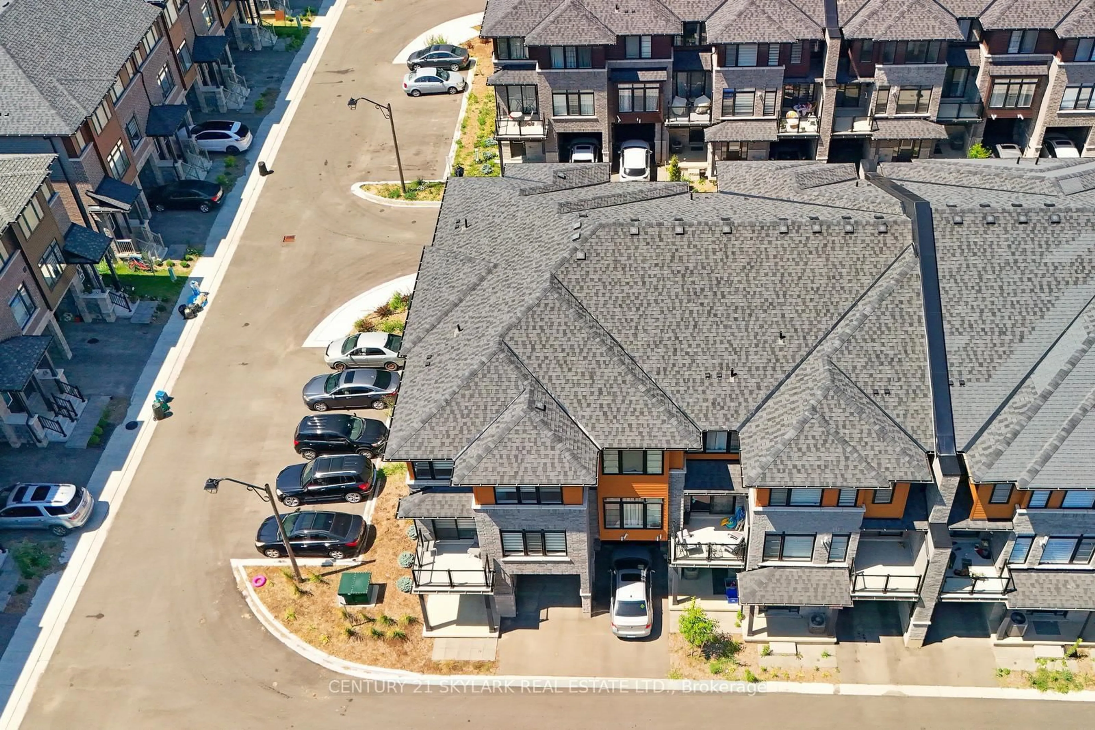 A pic from outside/outdoor area/front of a property/back of a property/a pic from drone, unknown for 461 Blackburn Dr #105, Brantford Ontario N3T 0W9