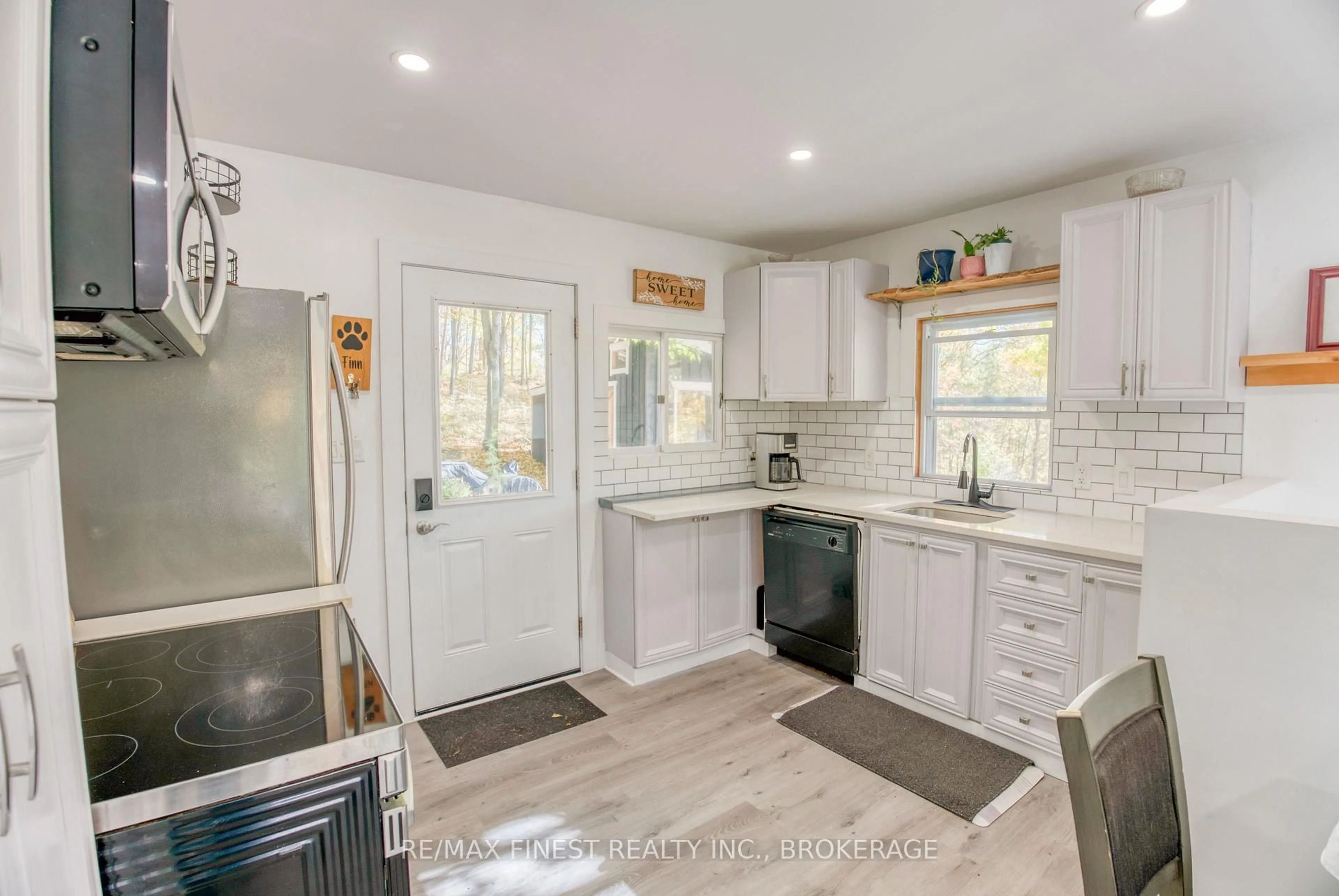 Open concept kitchen, ceramic/tile floor for 10874 Canoe Lake Rd, Tichborne Ontario K0H 2V0