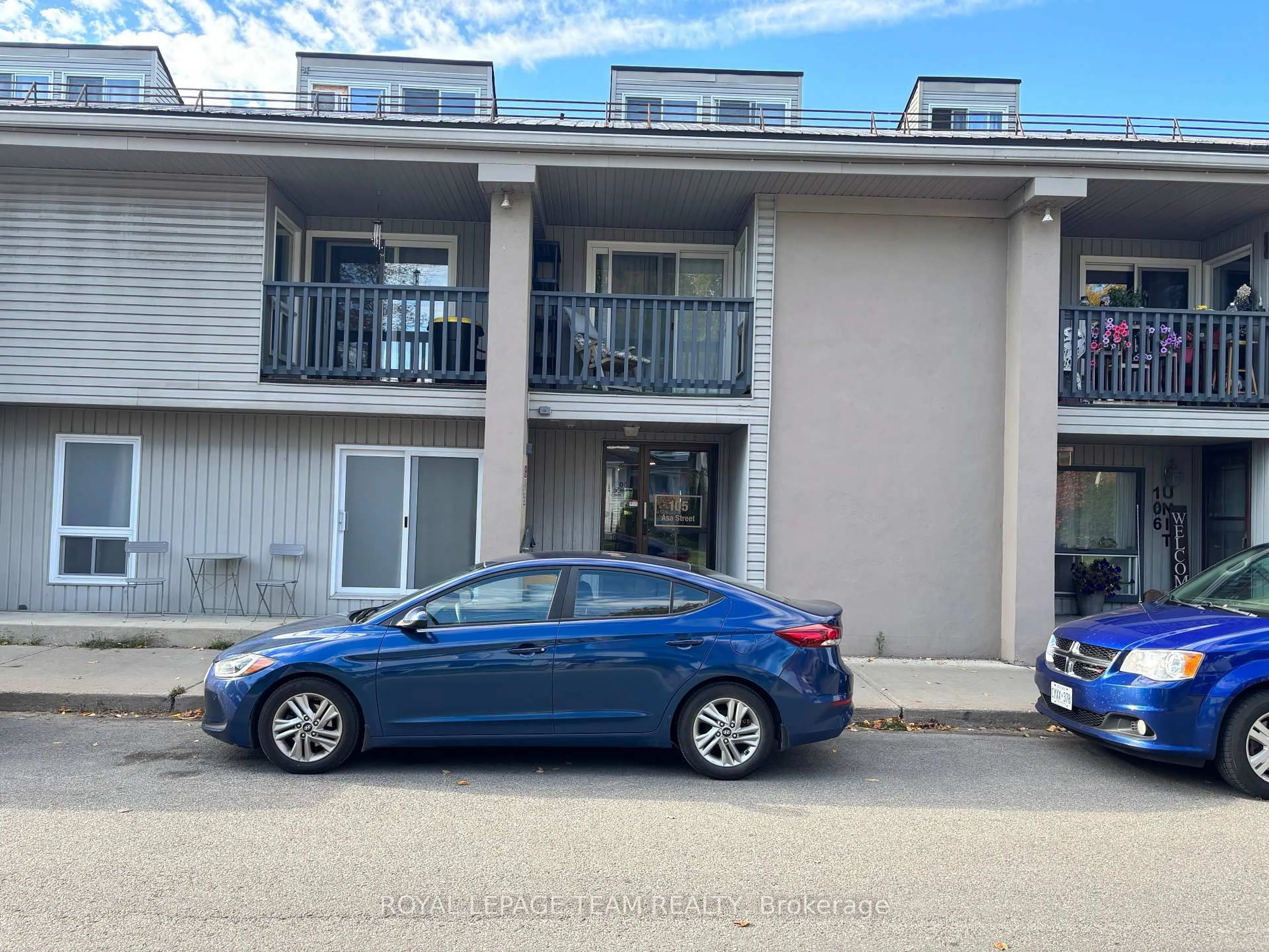 A pic from outside/outdoor area/front of a property/back of a property/a pic from drone, street for 105 Asa St #103, North Grenville Ontario K0G 1J0