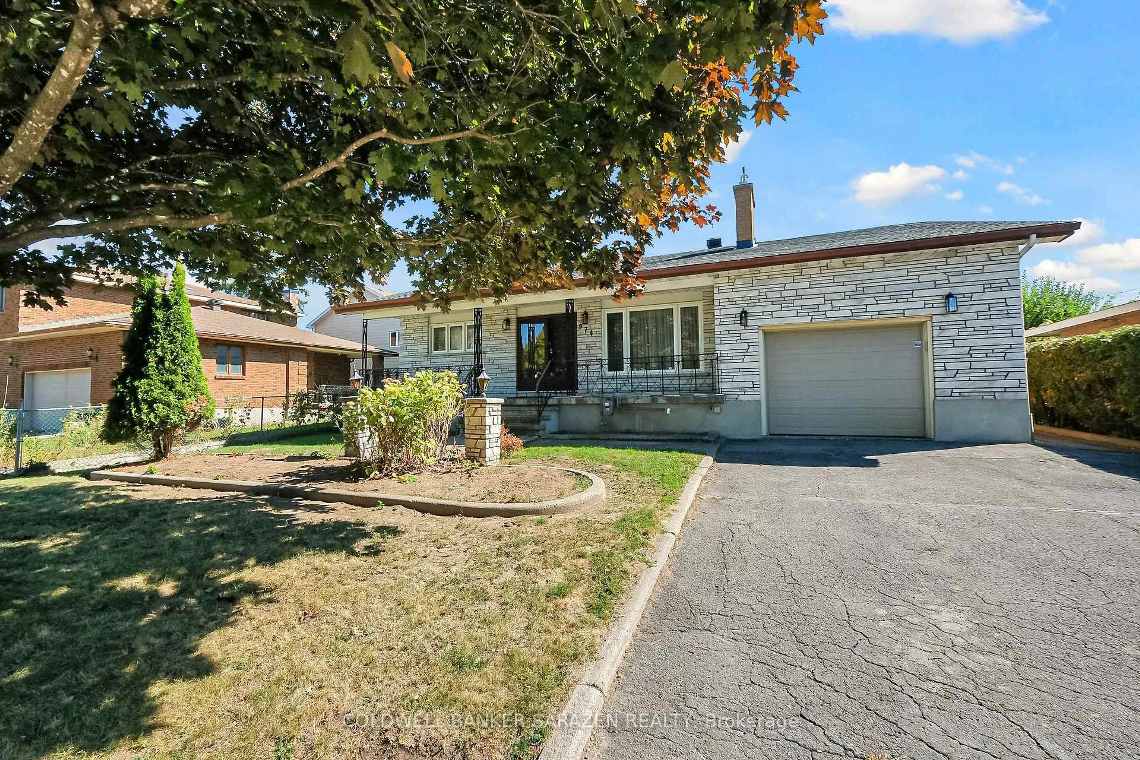 Home with brick exterior material, street for 974 Greenbriar Ave, Ottawa Ontario K2C 0J7