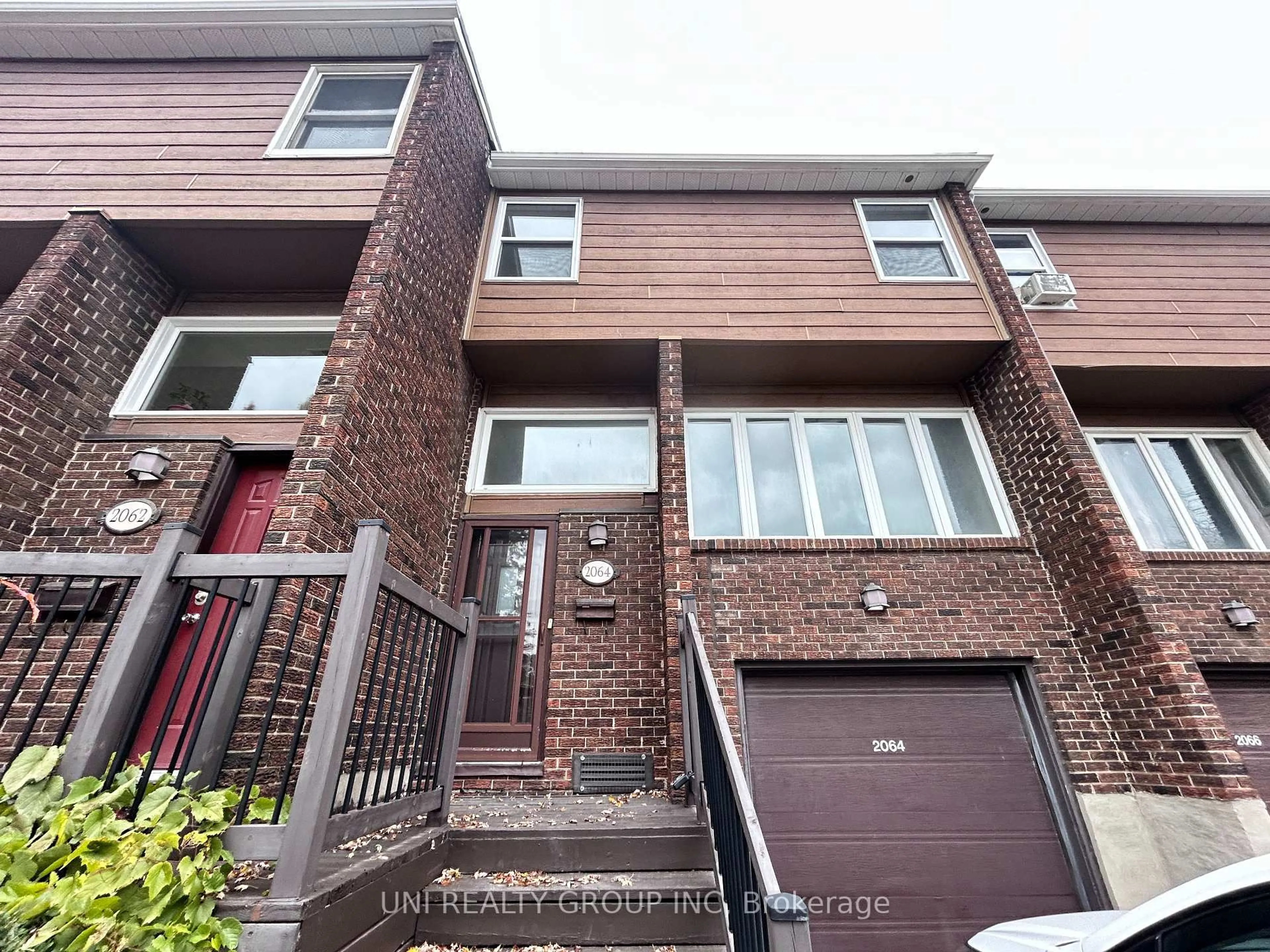 Home with brick exterior material, street for 2064 Eric Cres #77, Ottawa Ontario K1B 4P4