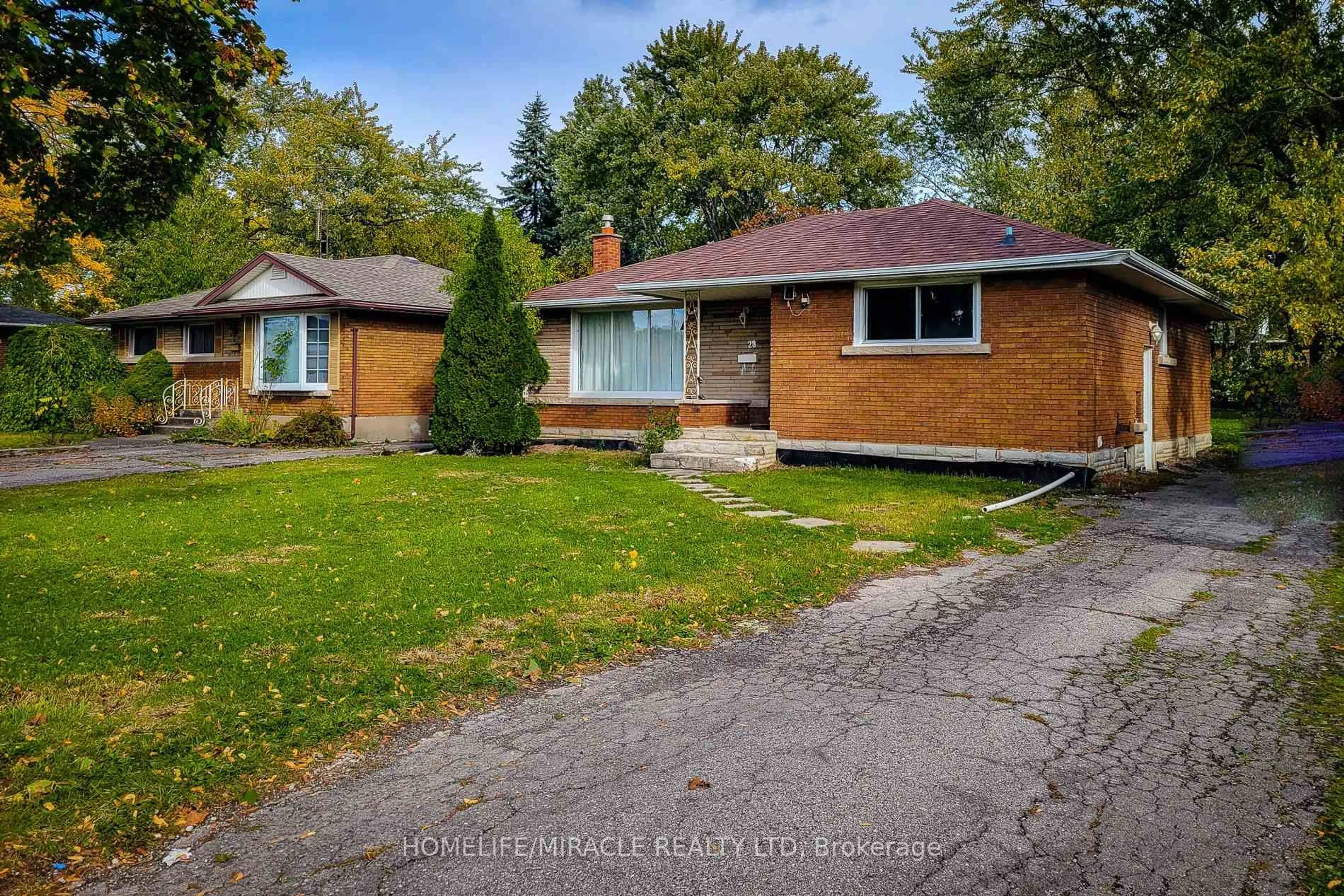 Home with brick exterior material, street for 28 Glengarry Rd, St. Catharines Ontario L2T 2T9